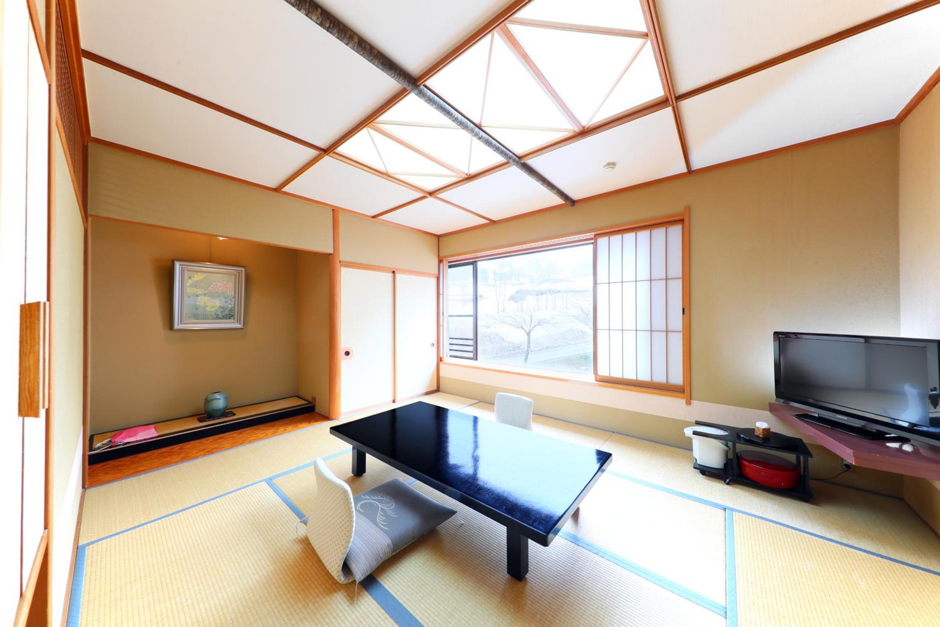 Quadruple Room with Private Bathroom