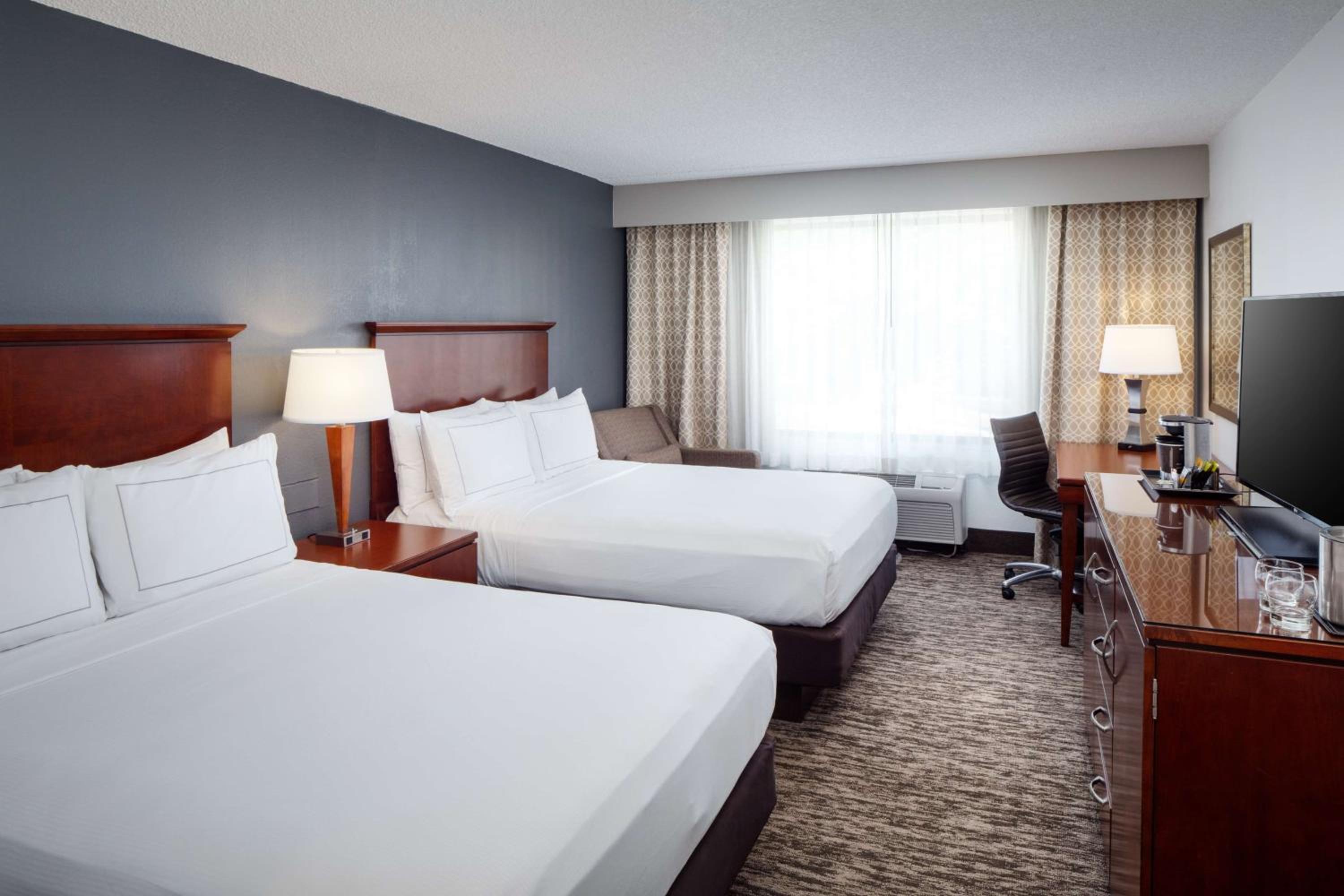 Queen Room with Two Queen Beds - Photo 1