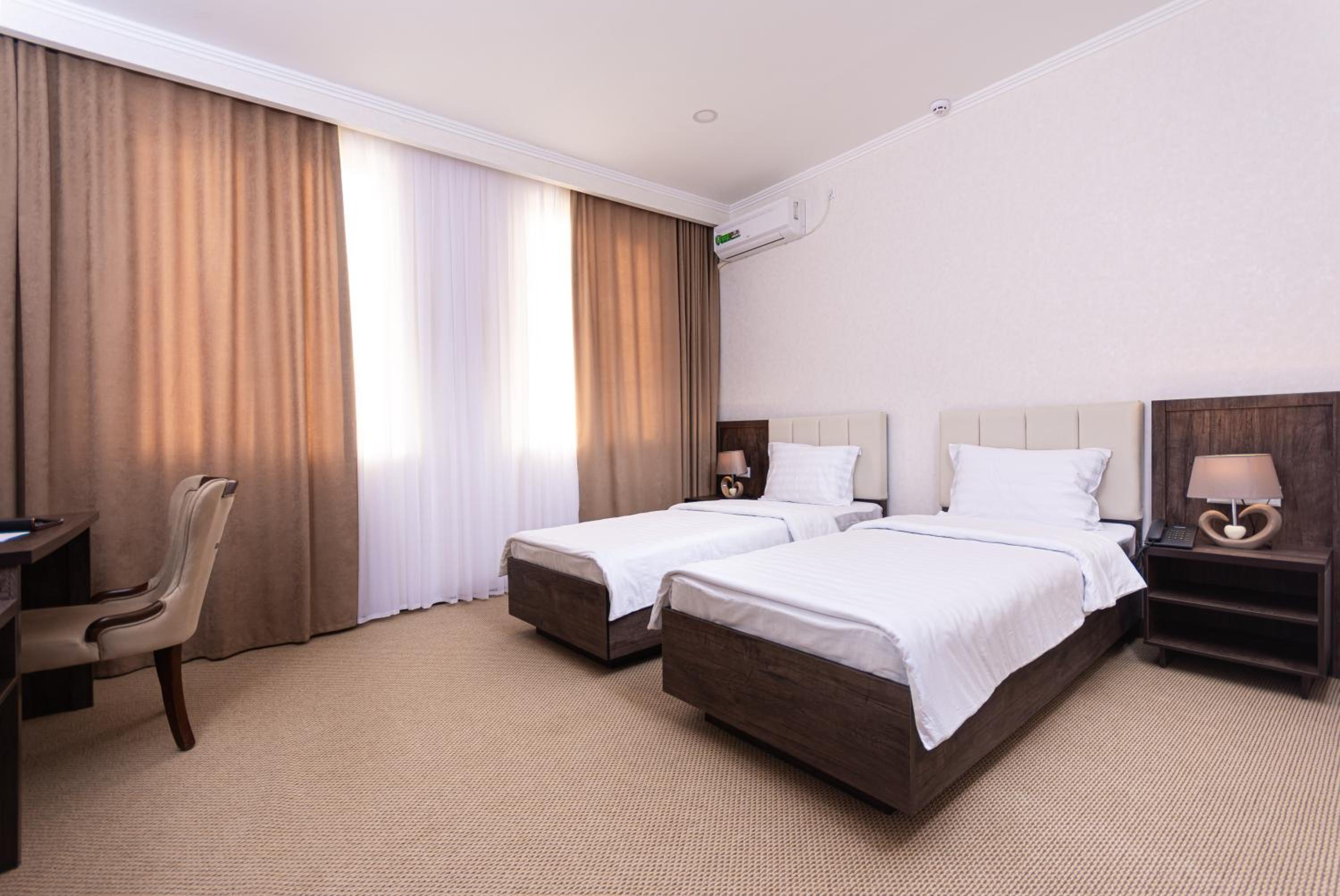 Standard Twin Room - Photo 2