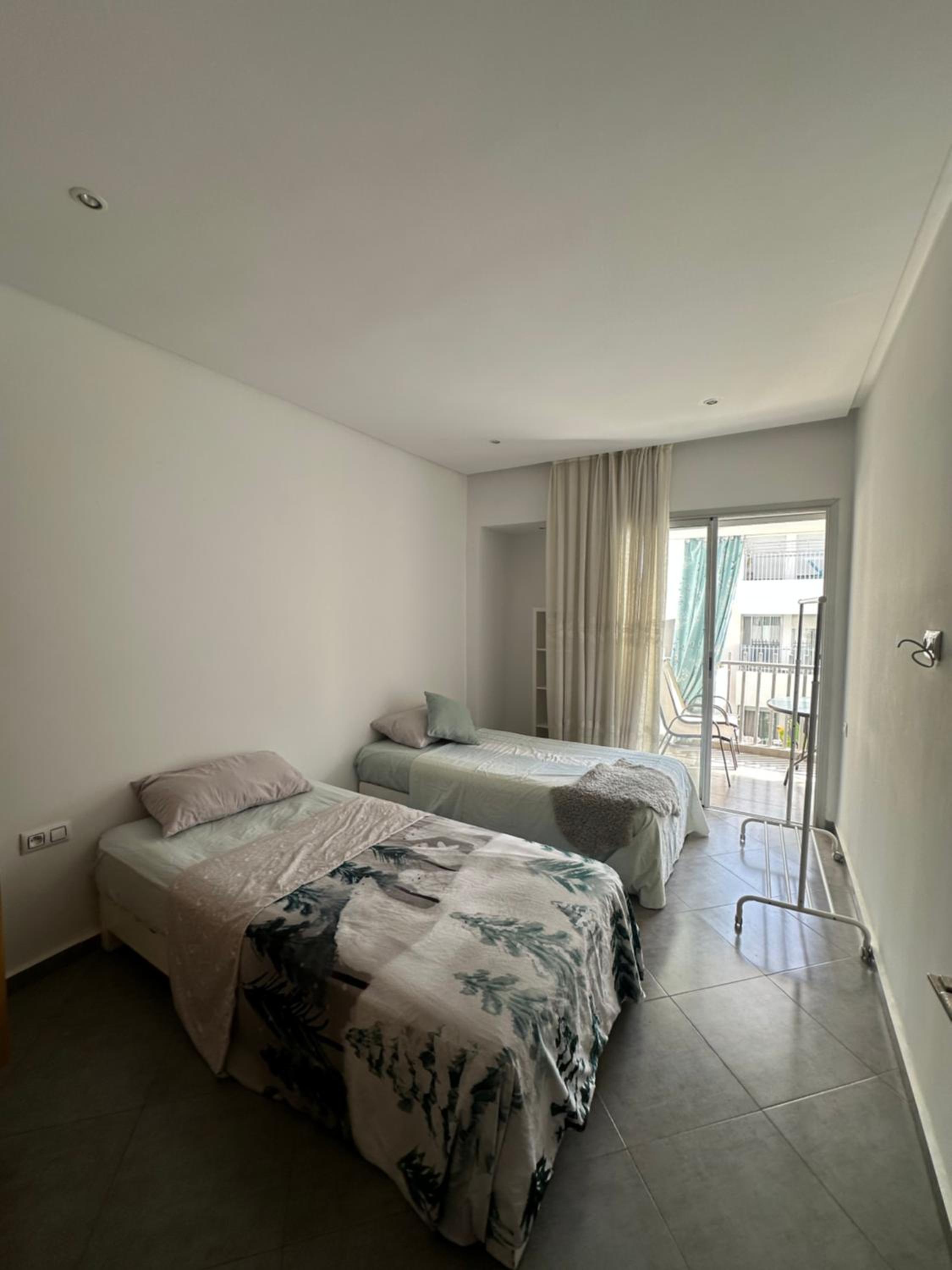 Three-Bedroom Apartment photo 1
