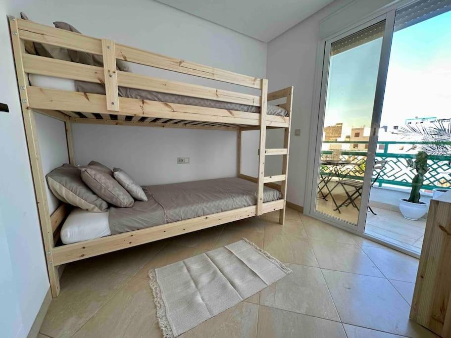 Three-Bedroom Apartment photo 2