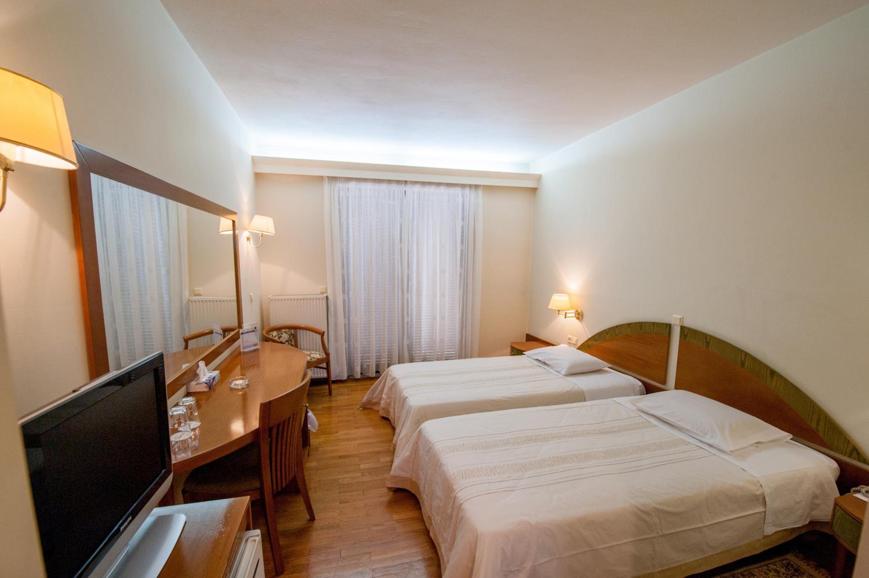 Twin Room - Photo 1