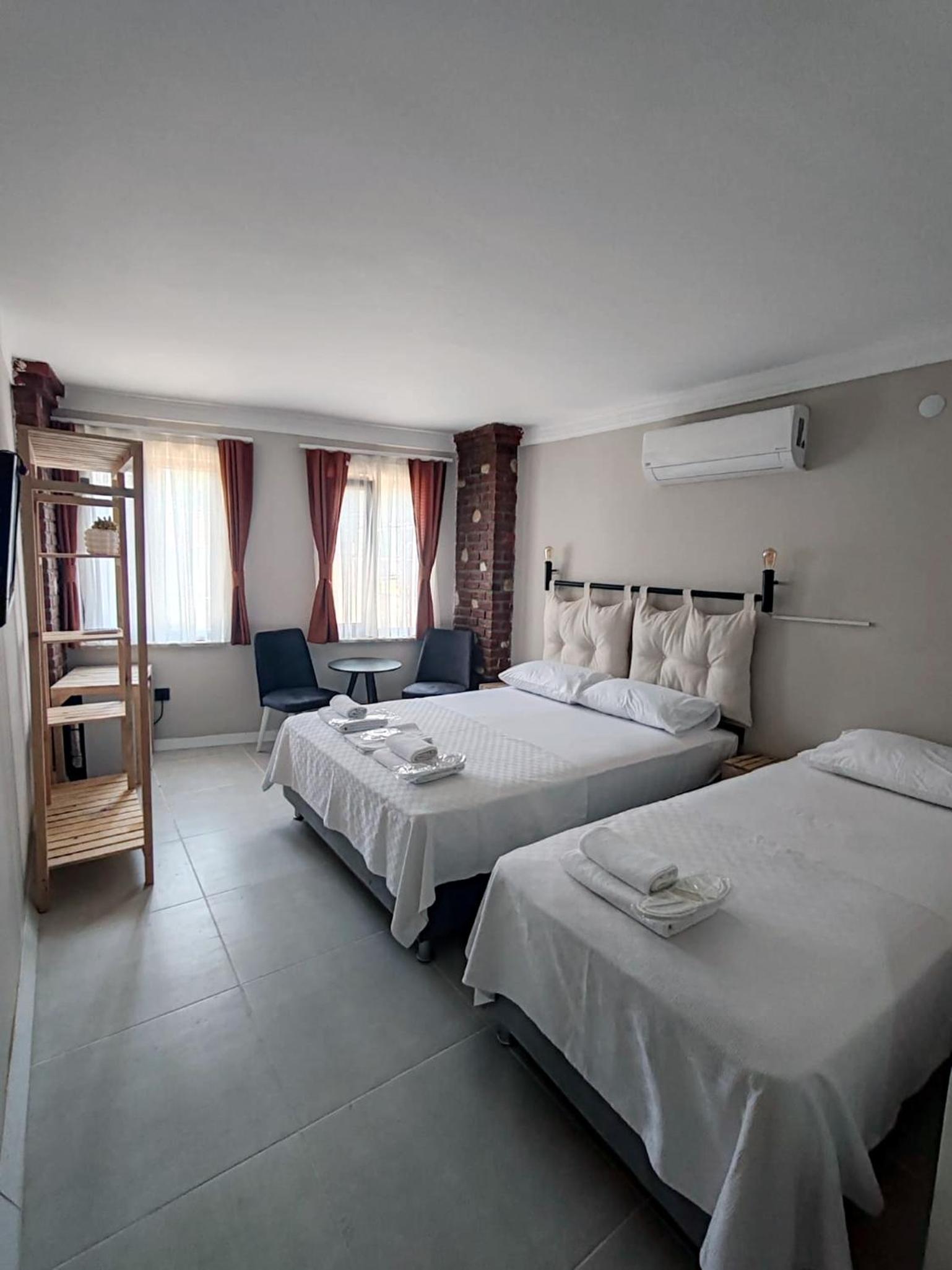 Deluxe Triple Room - Photo 1