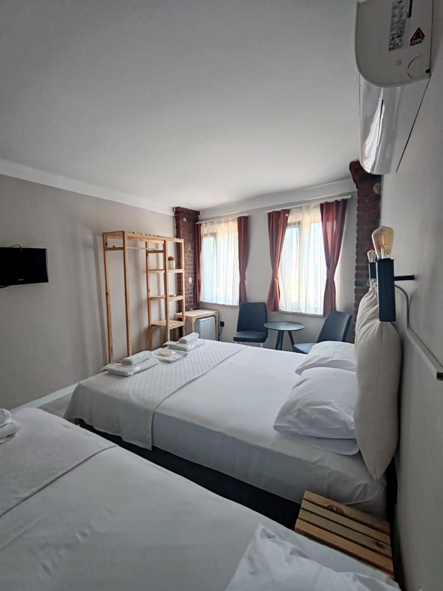 Deluxe Triple Room - Photo 11