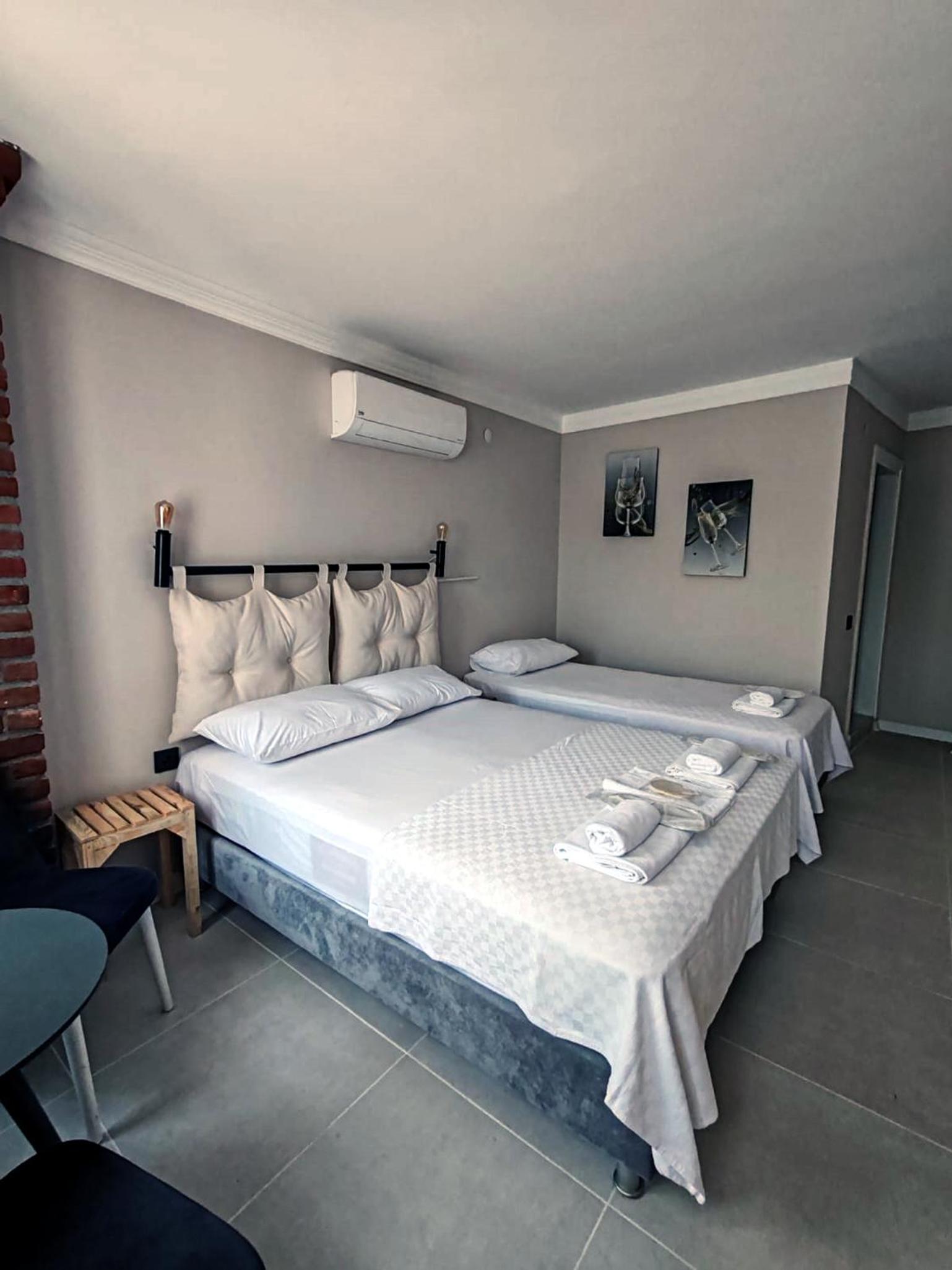 Deluxe Triple Room - Photo 10