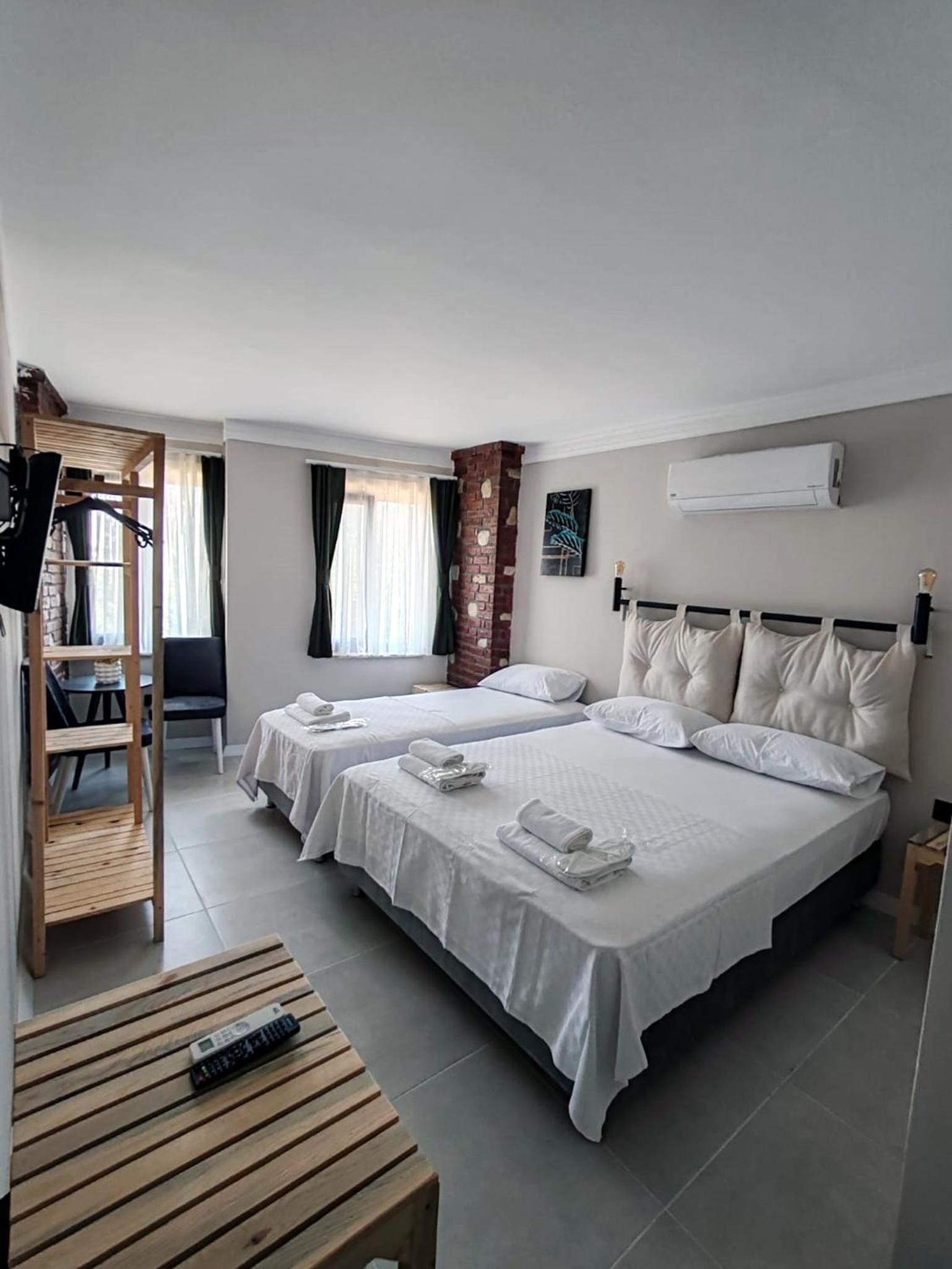 Deluxe Triple Room - Photo 8