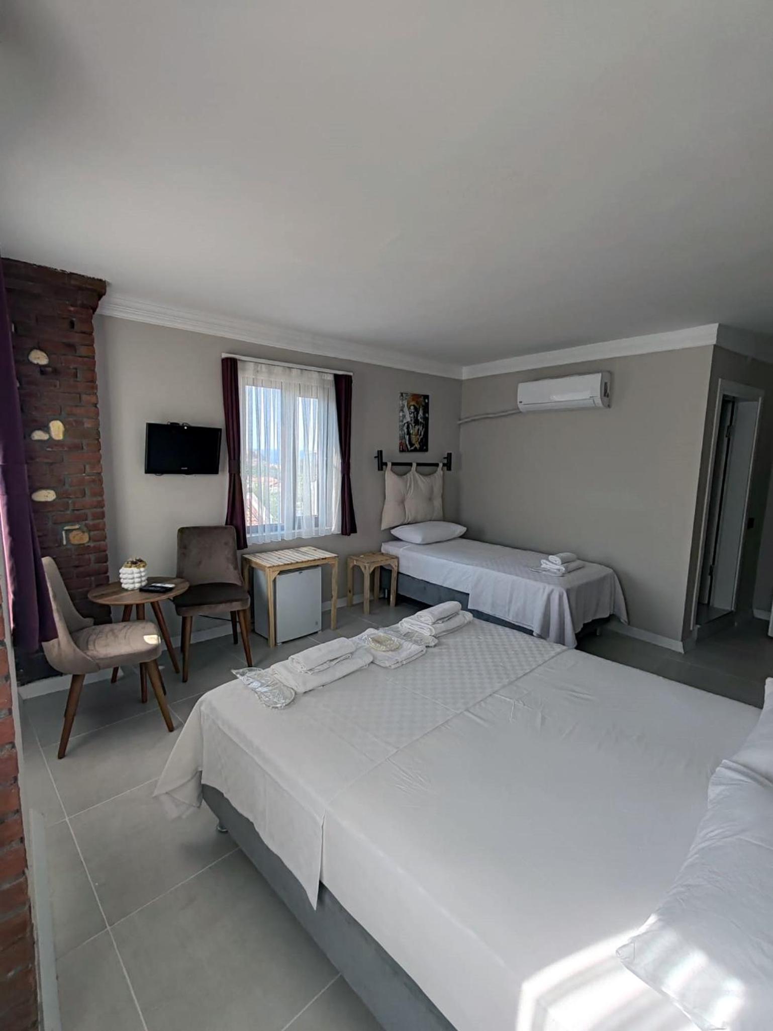 Deluxe Triple Room - Photo 5