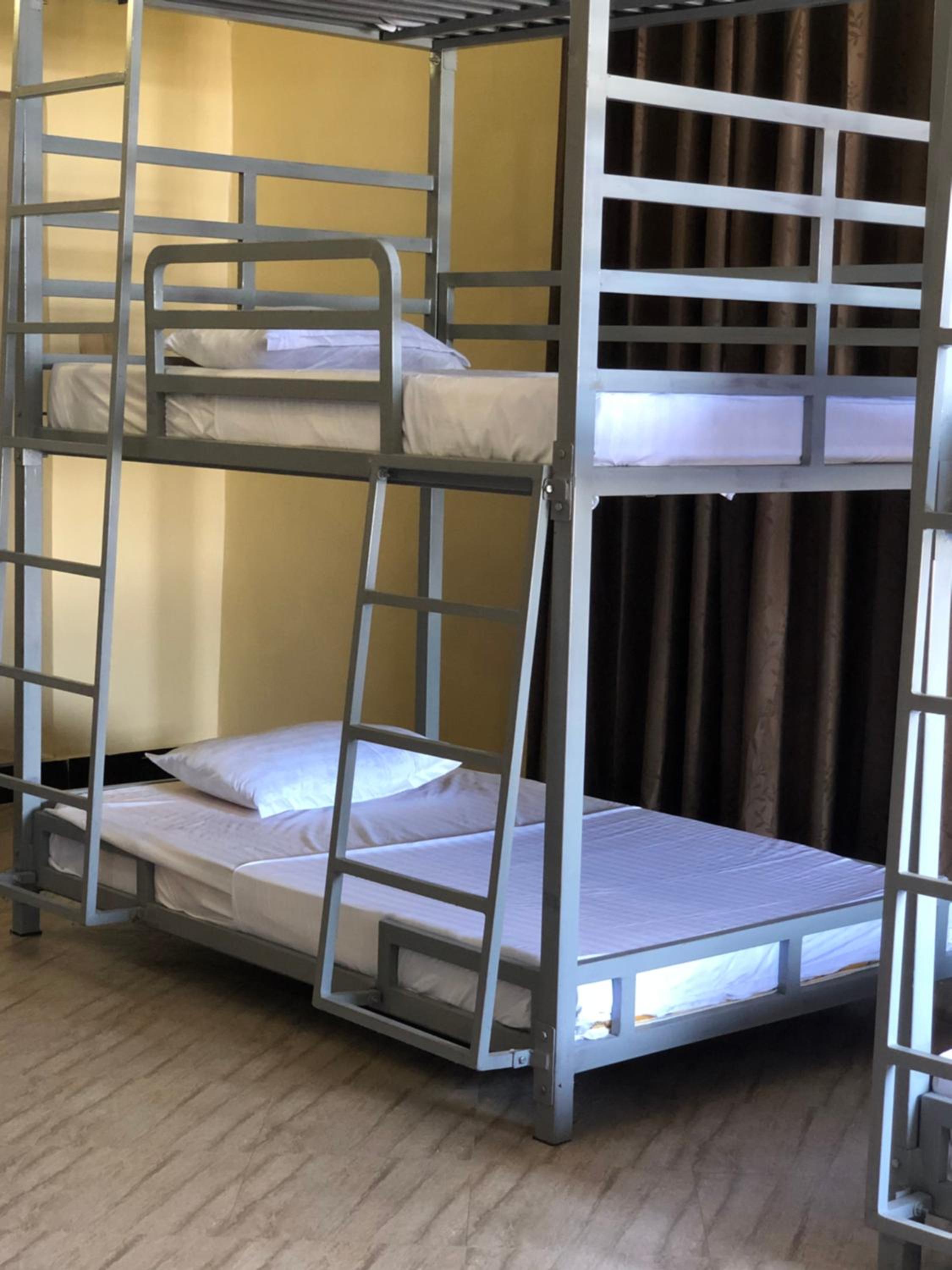 Single Bed In Female Dormitory Room photo 1