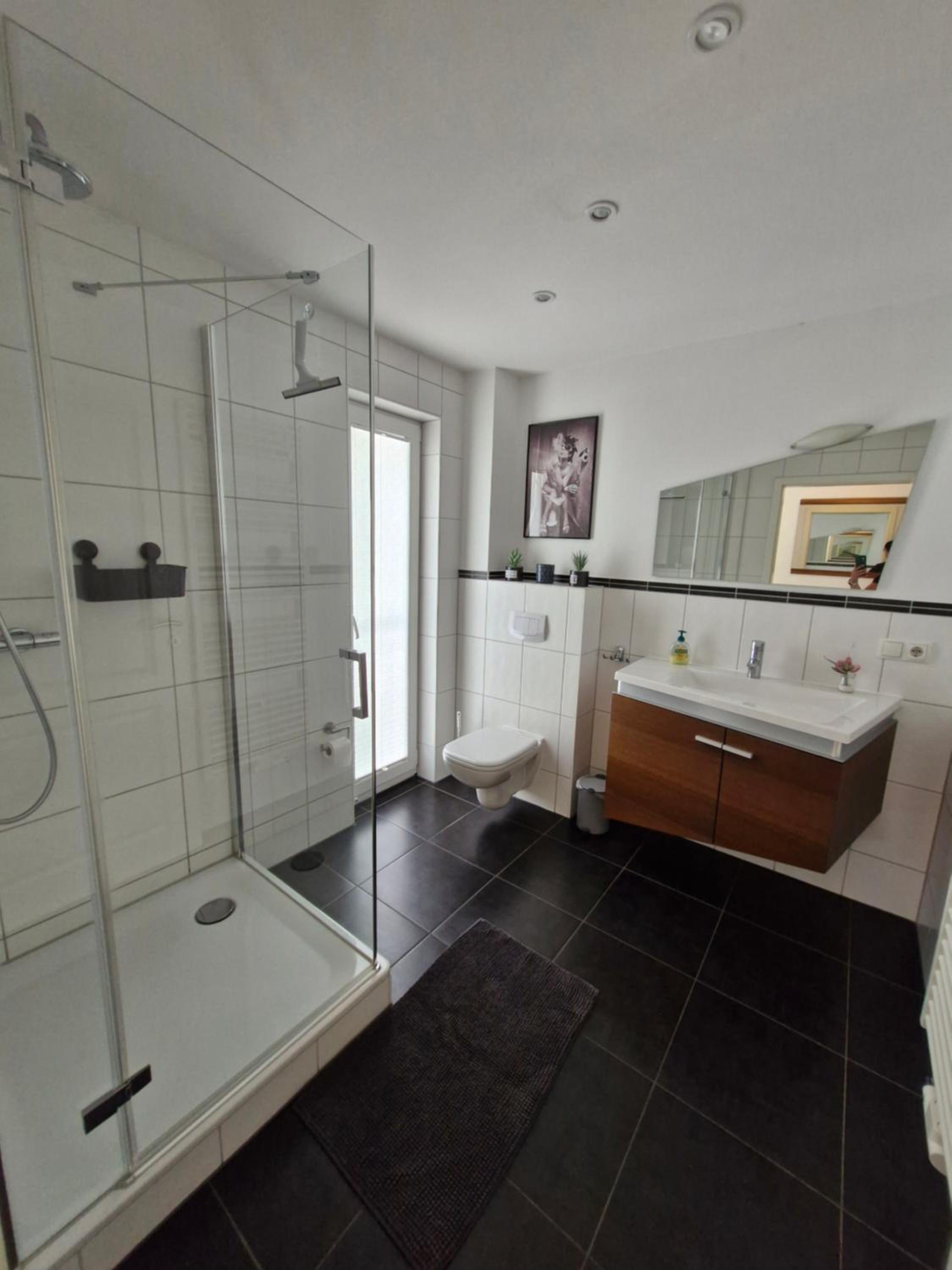Three-Bedroom Apartment - Photo 18
