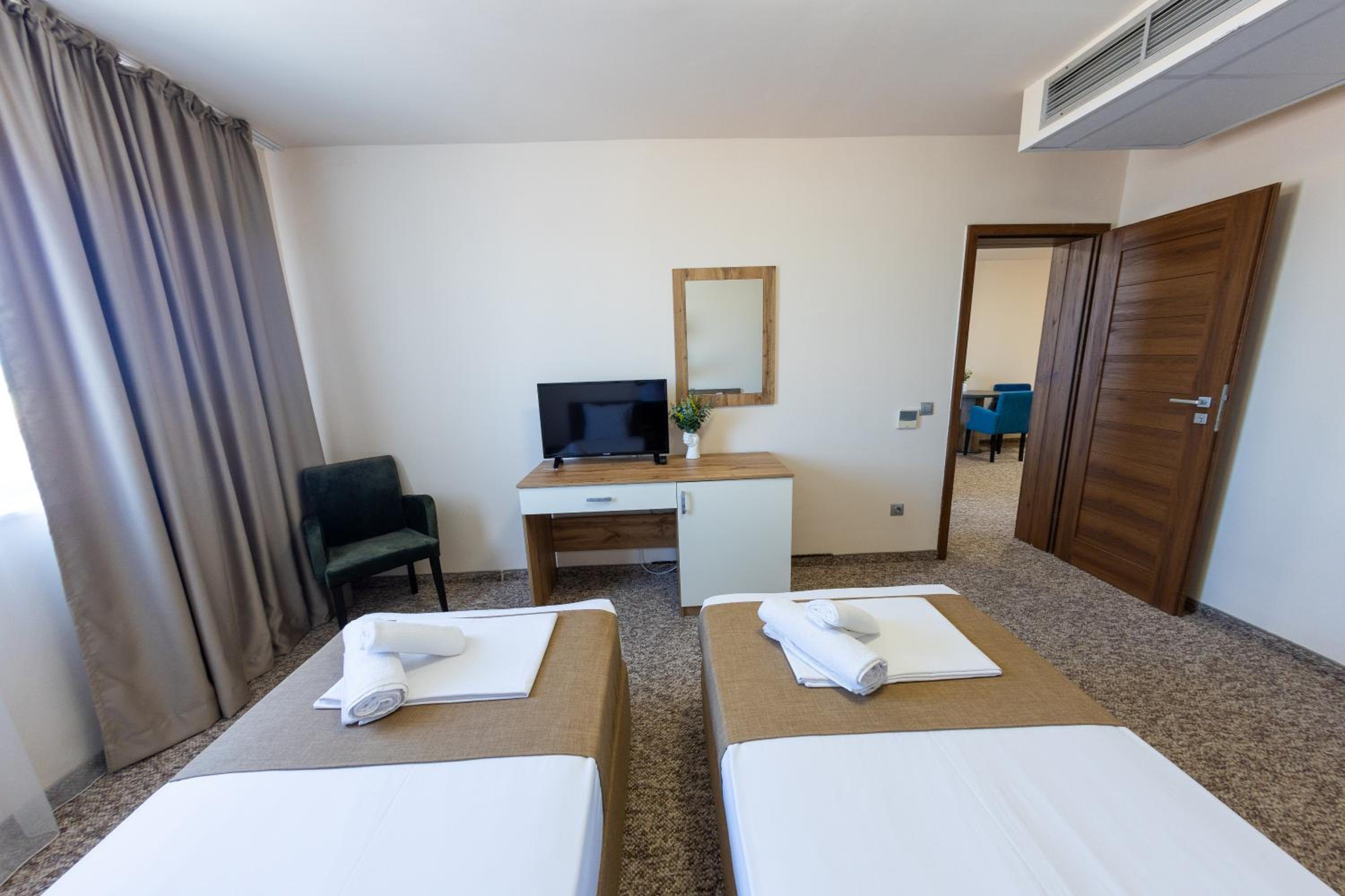 Three-Bedroom Apartment with Balcony photo 2