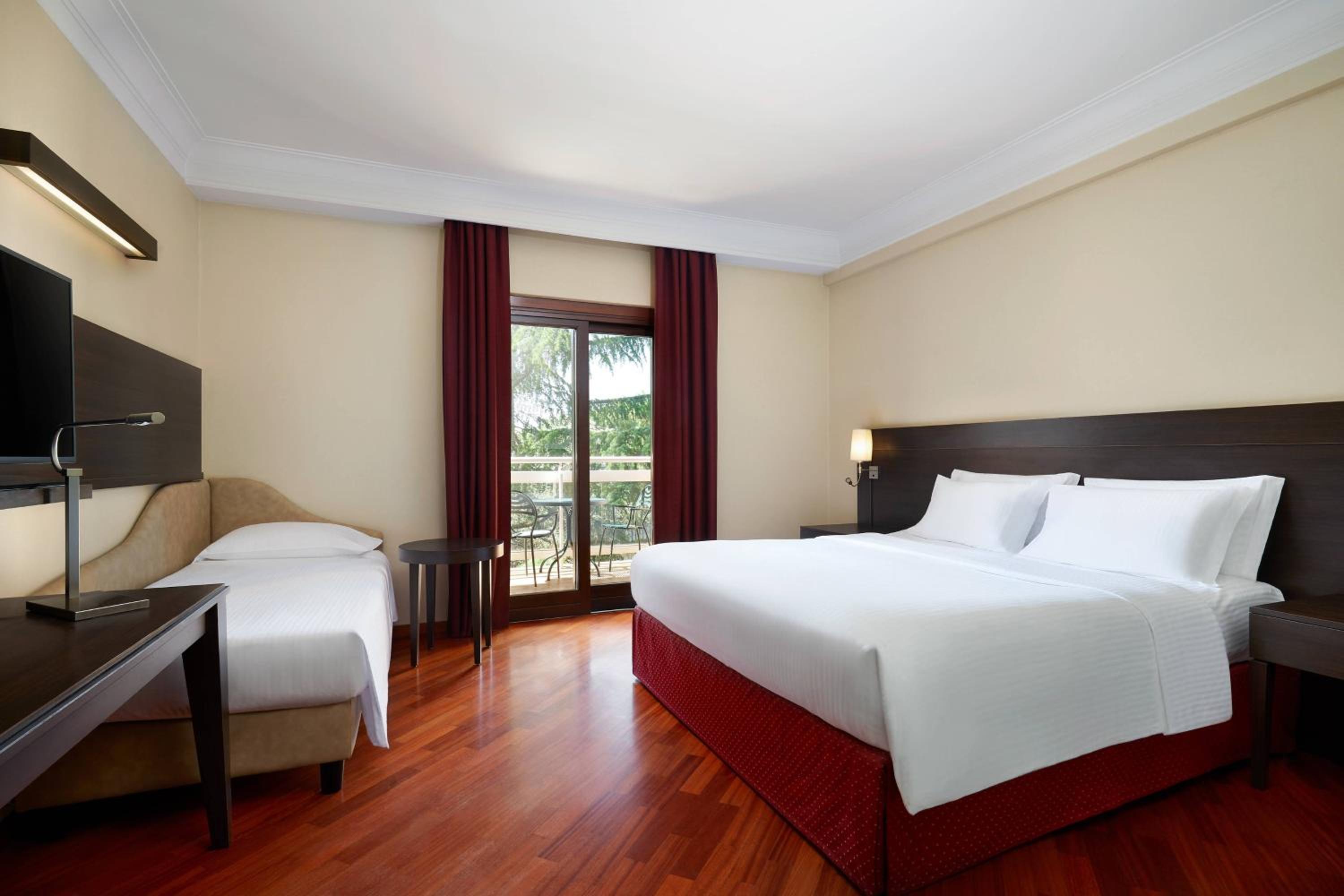 King Room with Sofa Bed and Balcony