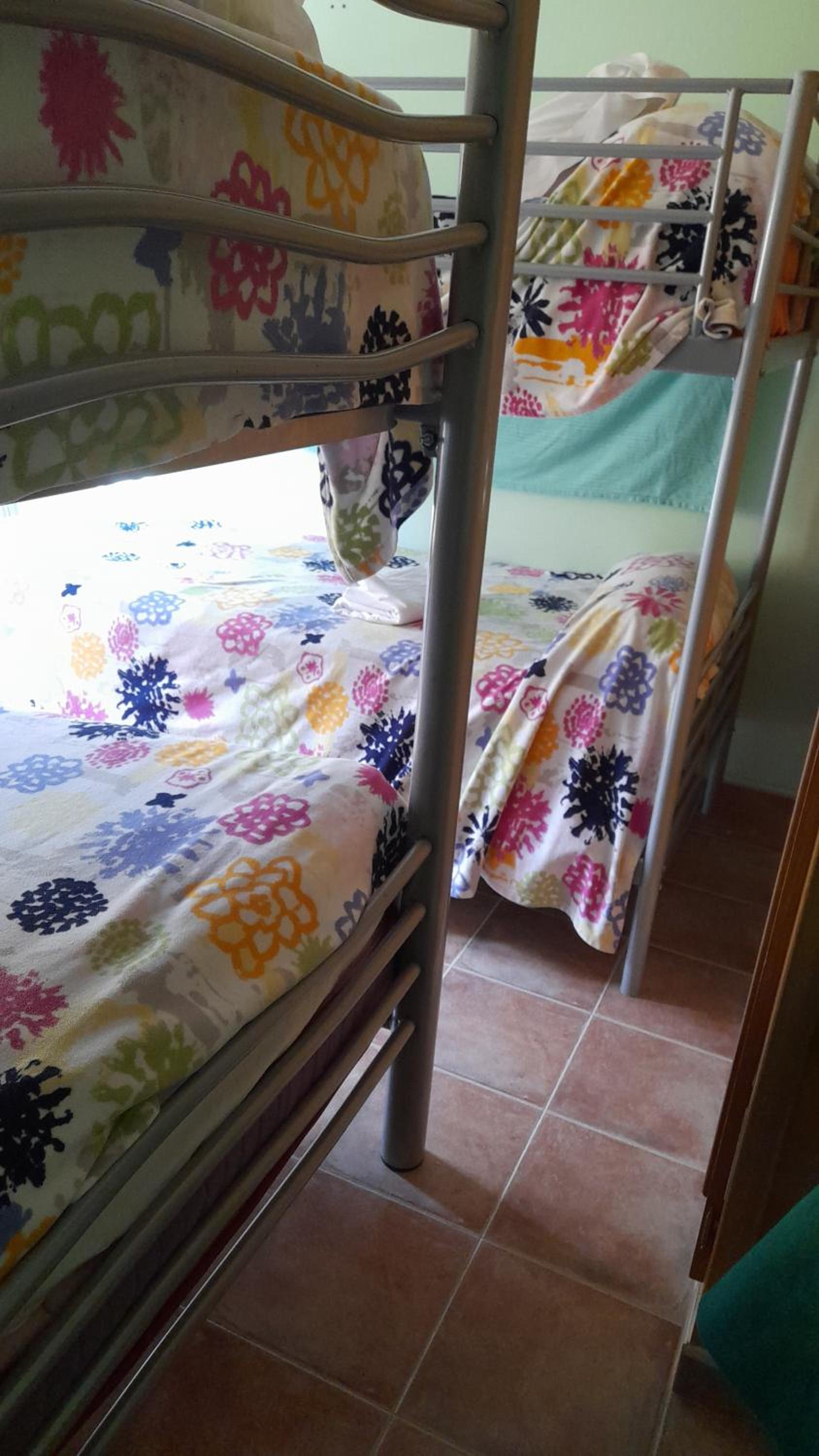 Cama en habitación compartida de 4 camas