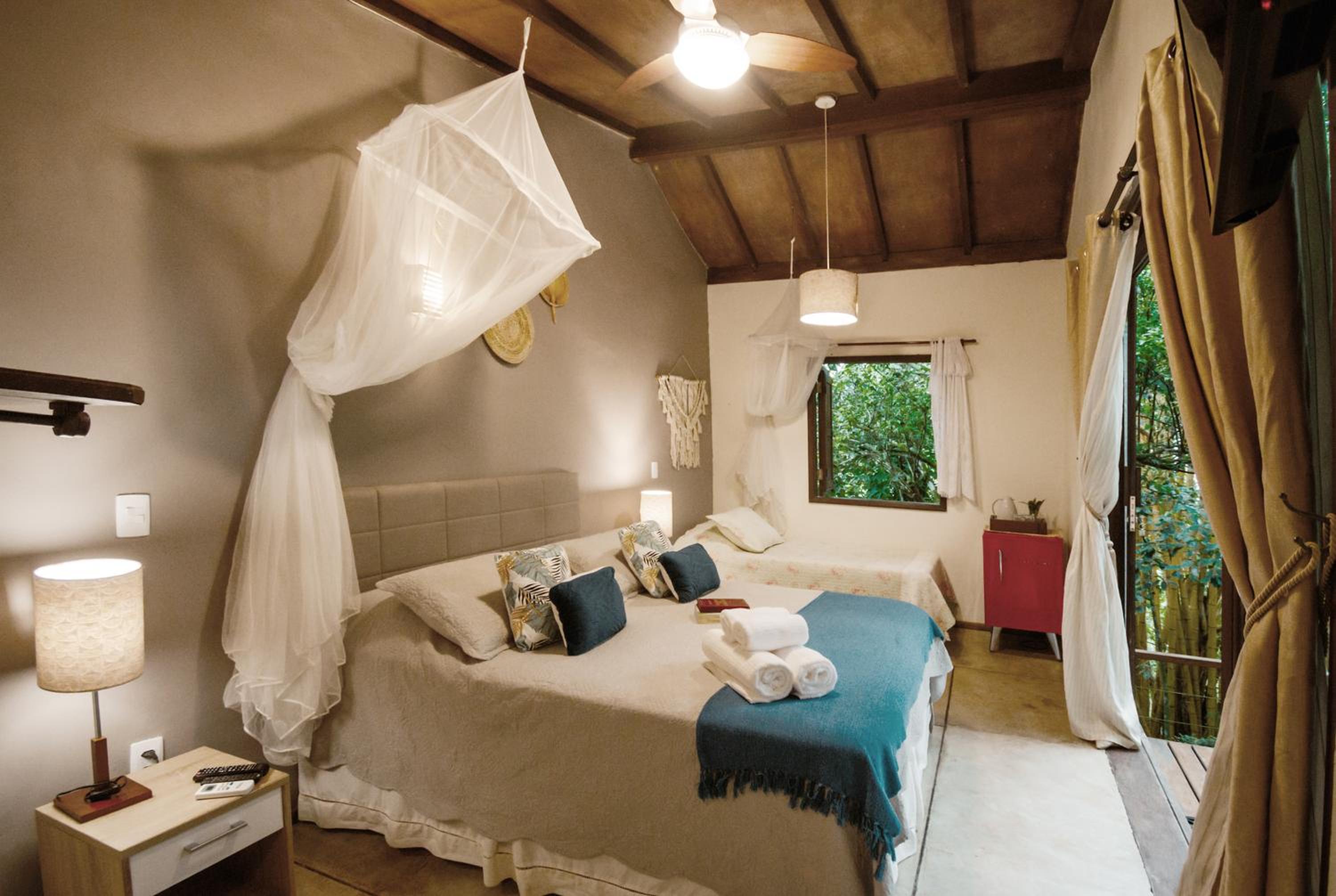 Standard Suite with a Stairway and Forest View