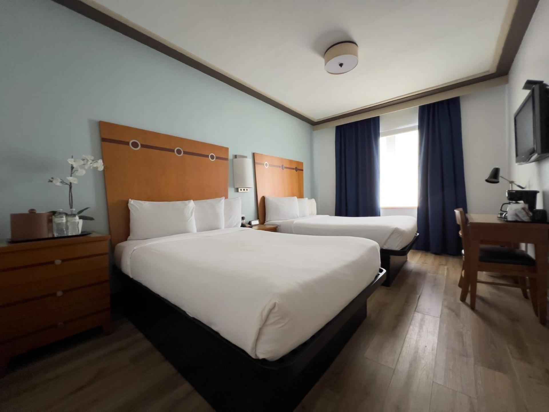Double Room with Two Double Beds and Partial Ocean View - Non-Smoking