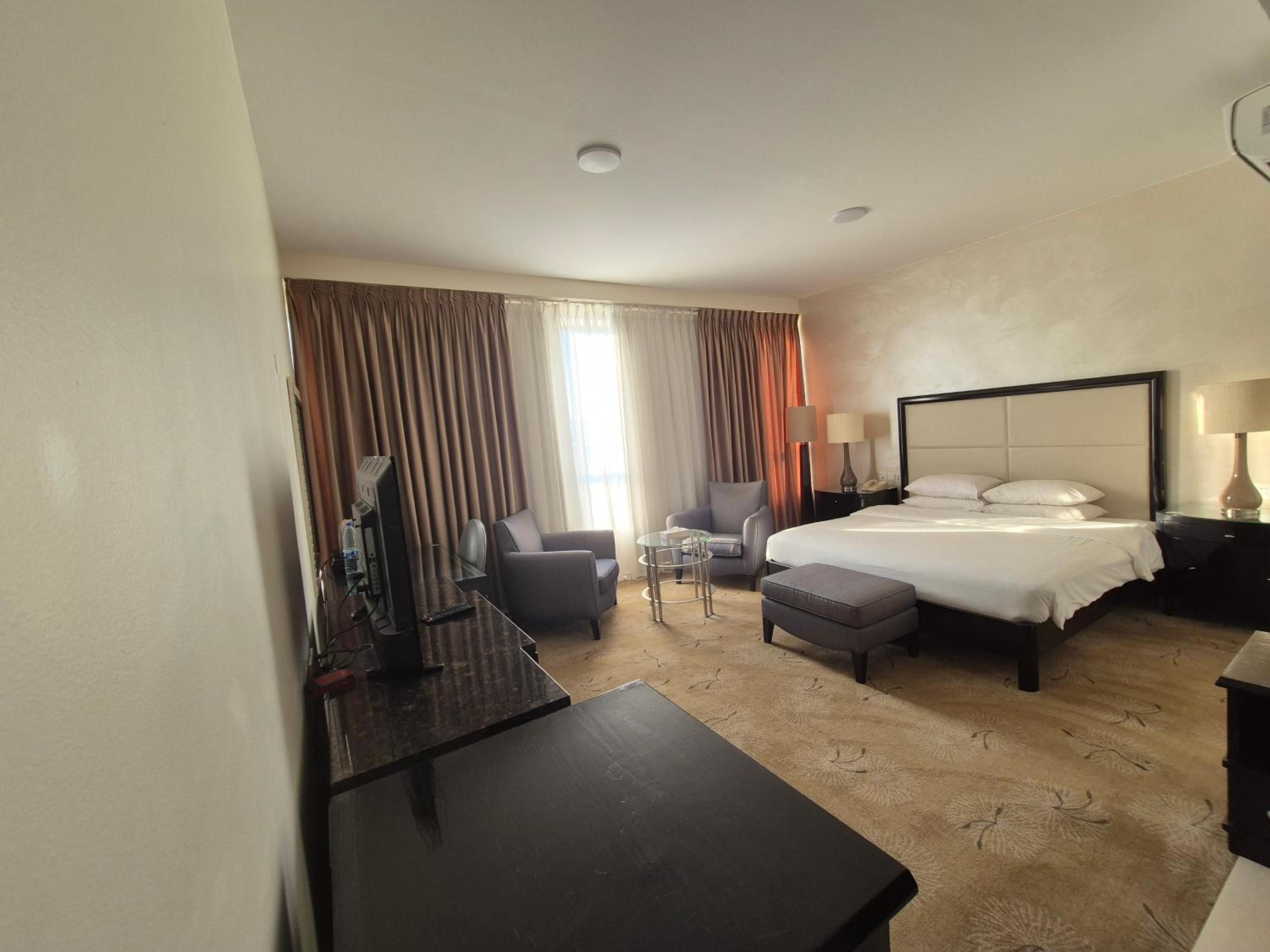 Deluxe Room - Photo 1
