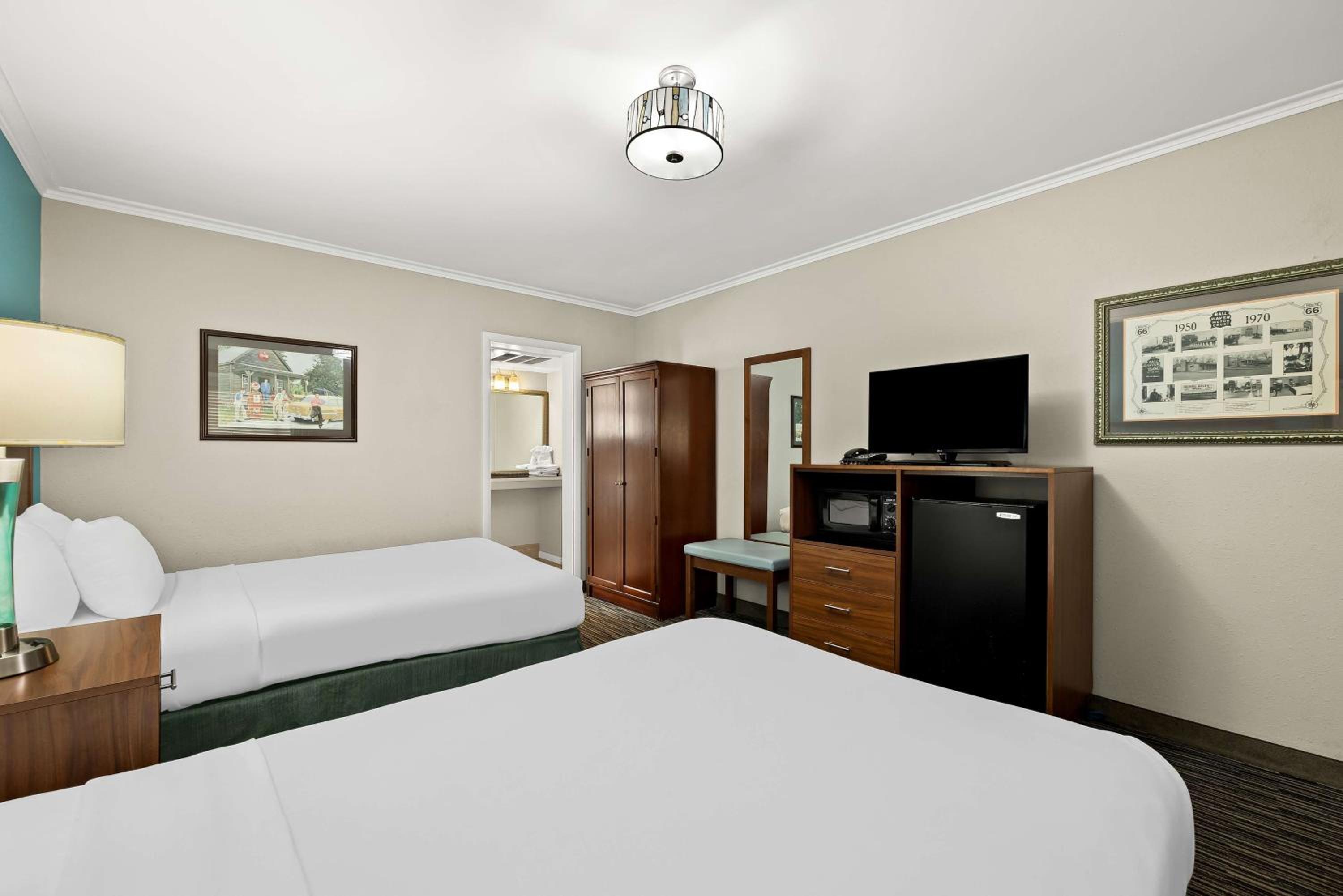 Double Room with Two Double Beds with Roll In Shower photo 2