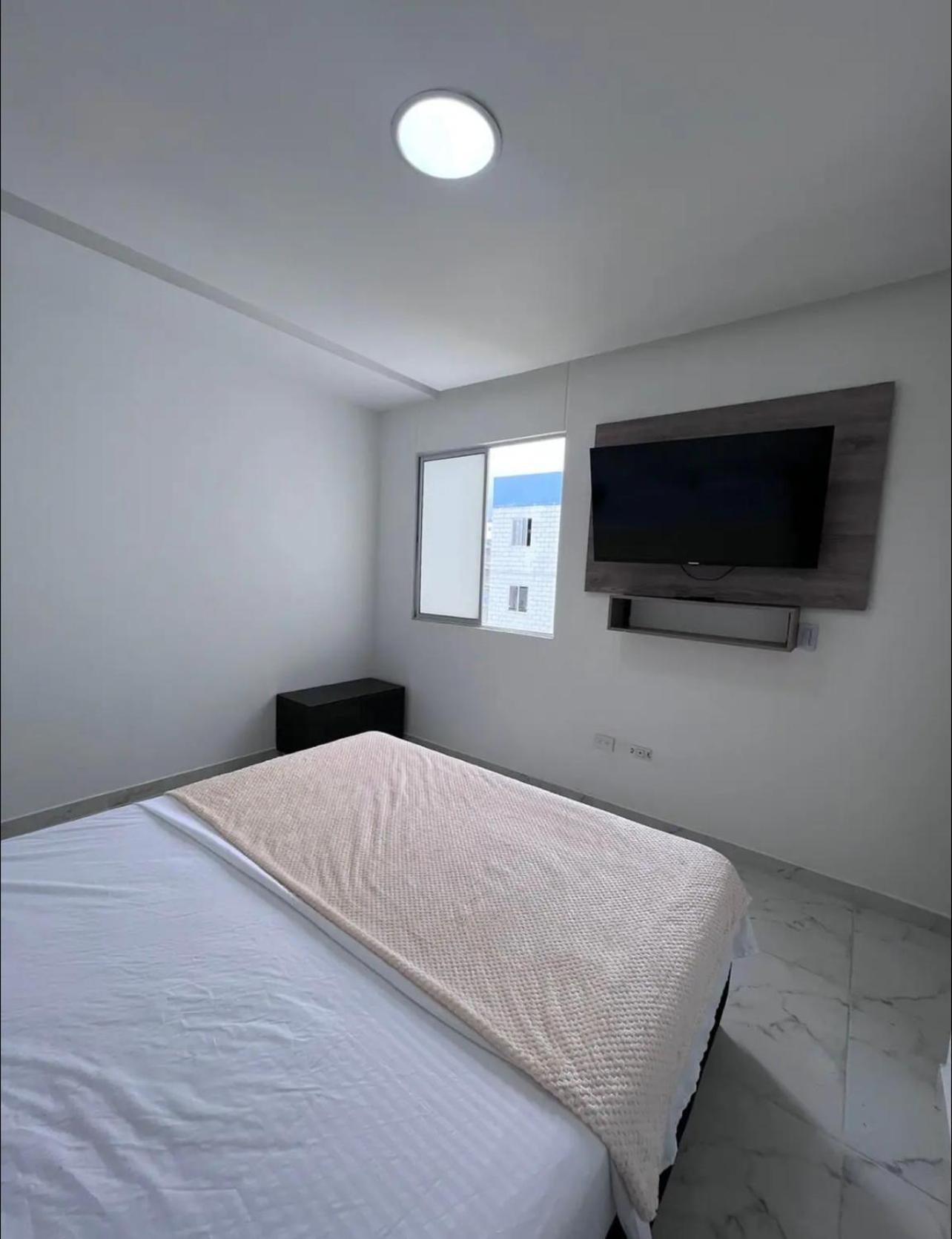 Three-Bedroom Apartment photo 1