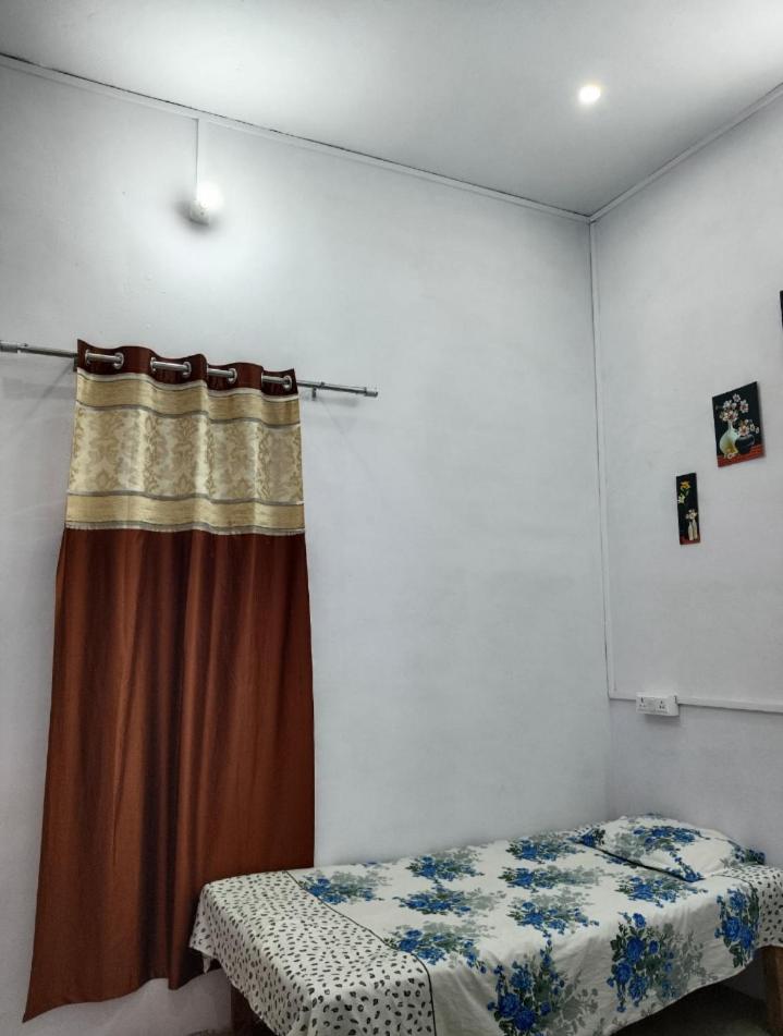 Single Bed in Dormitory Room