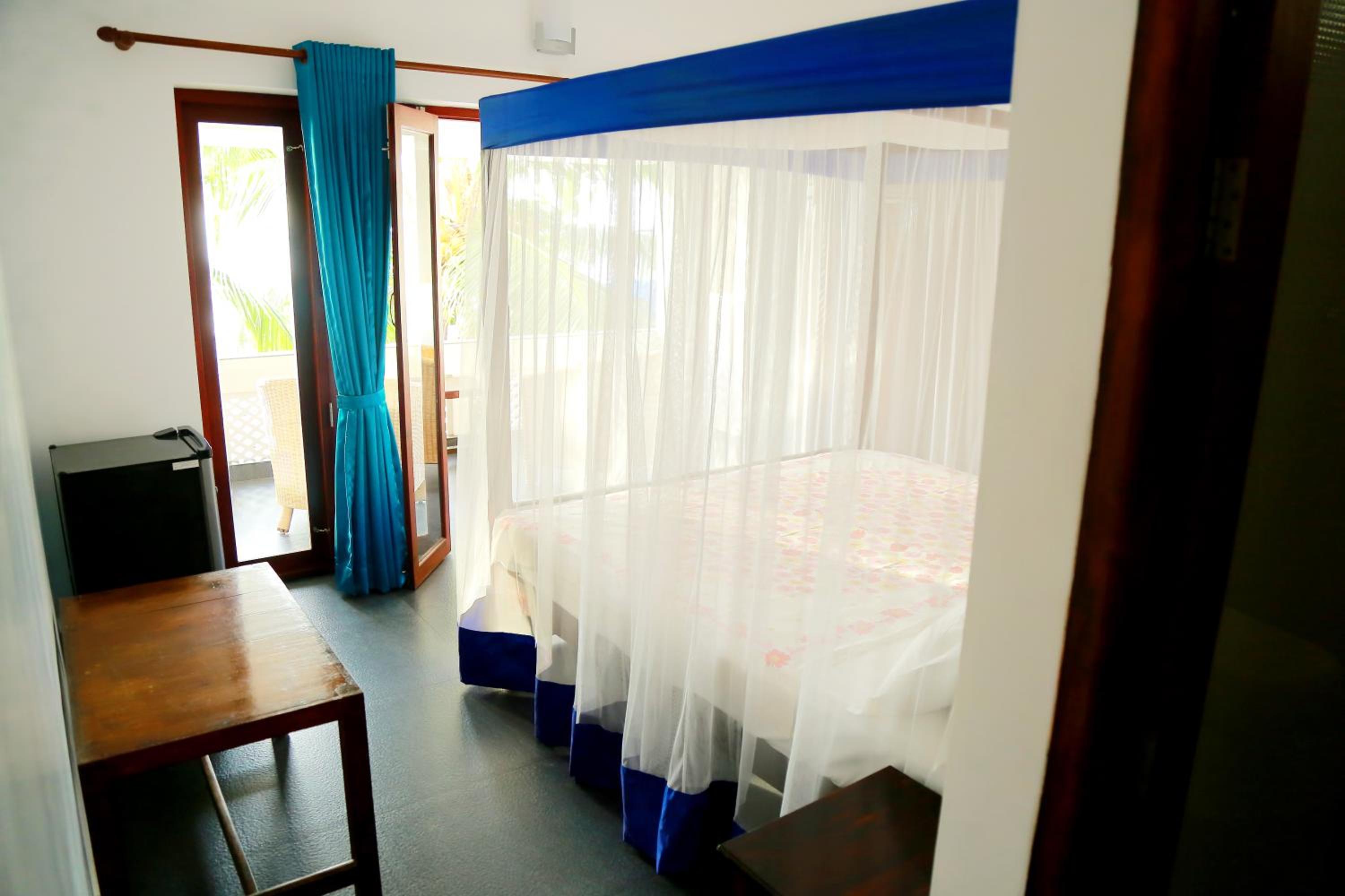 Double Room with Fan - Sea View photo 1