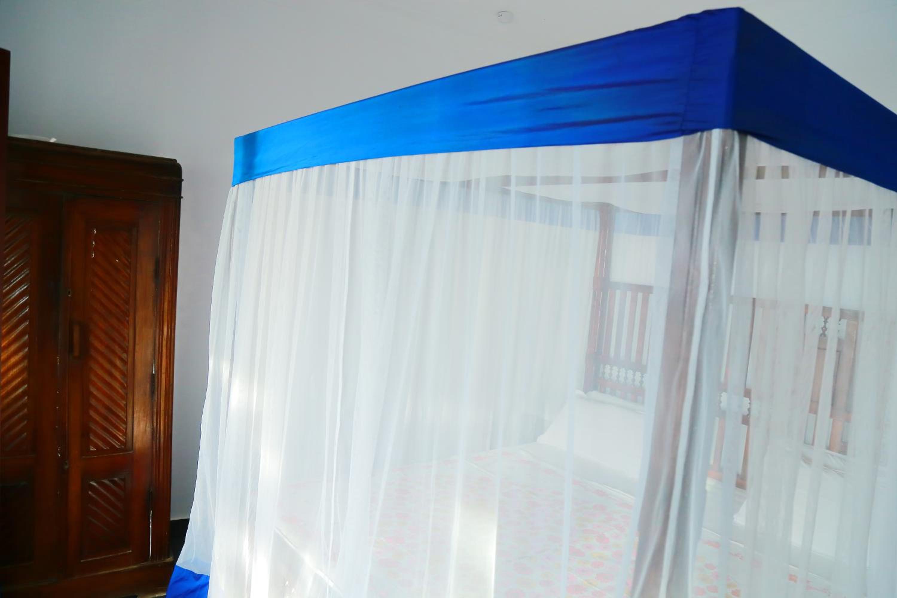 Double Room with Fan - Sea View photo 2