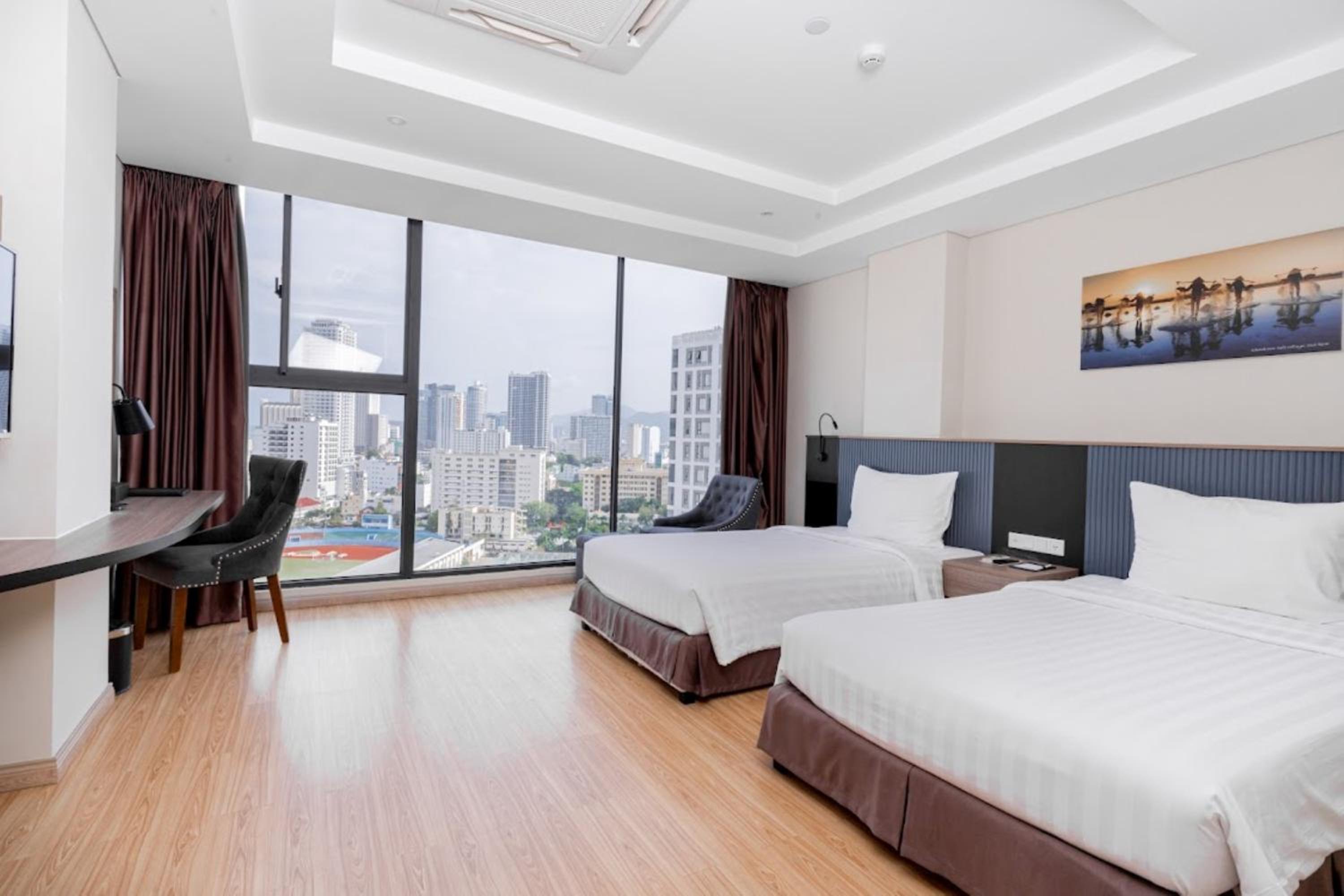 Deluxe Room with City View - Photo 1