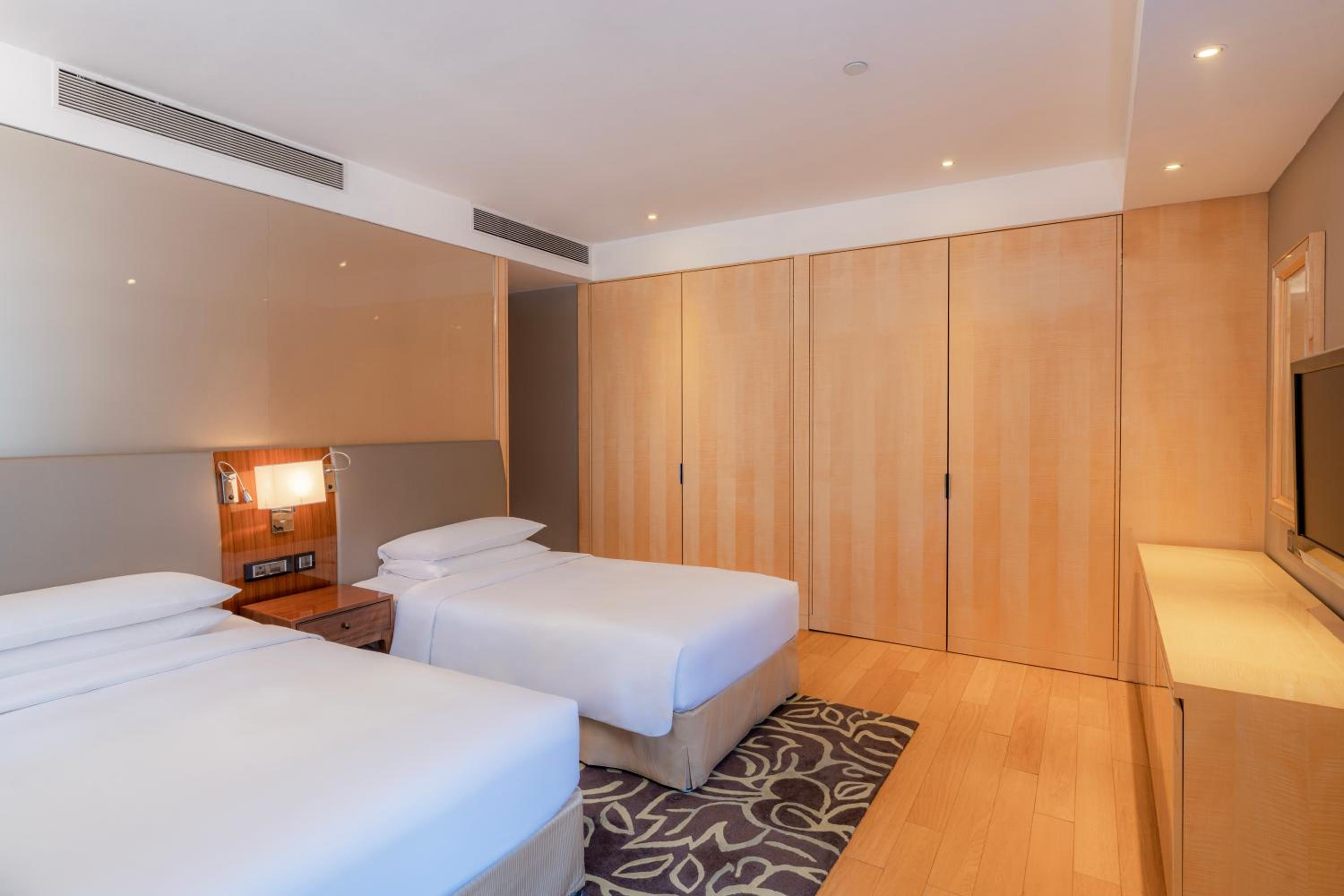 Two-Bedroom Executive Apartment 1 King Bed & 2 Twin Beds Two-Bedroom Executive Apartment 1 King Bed & 2 Twin Beds