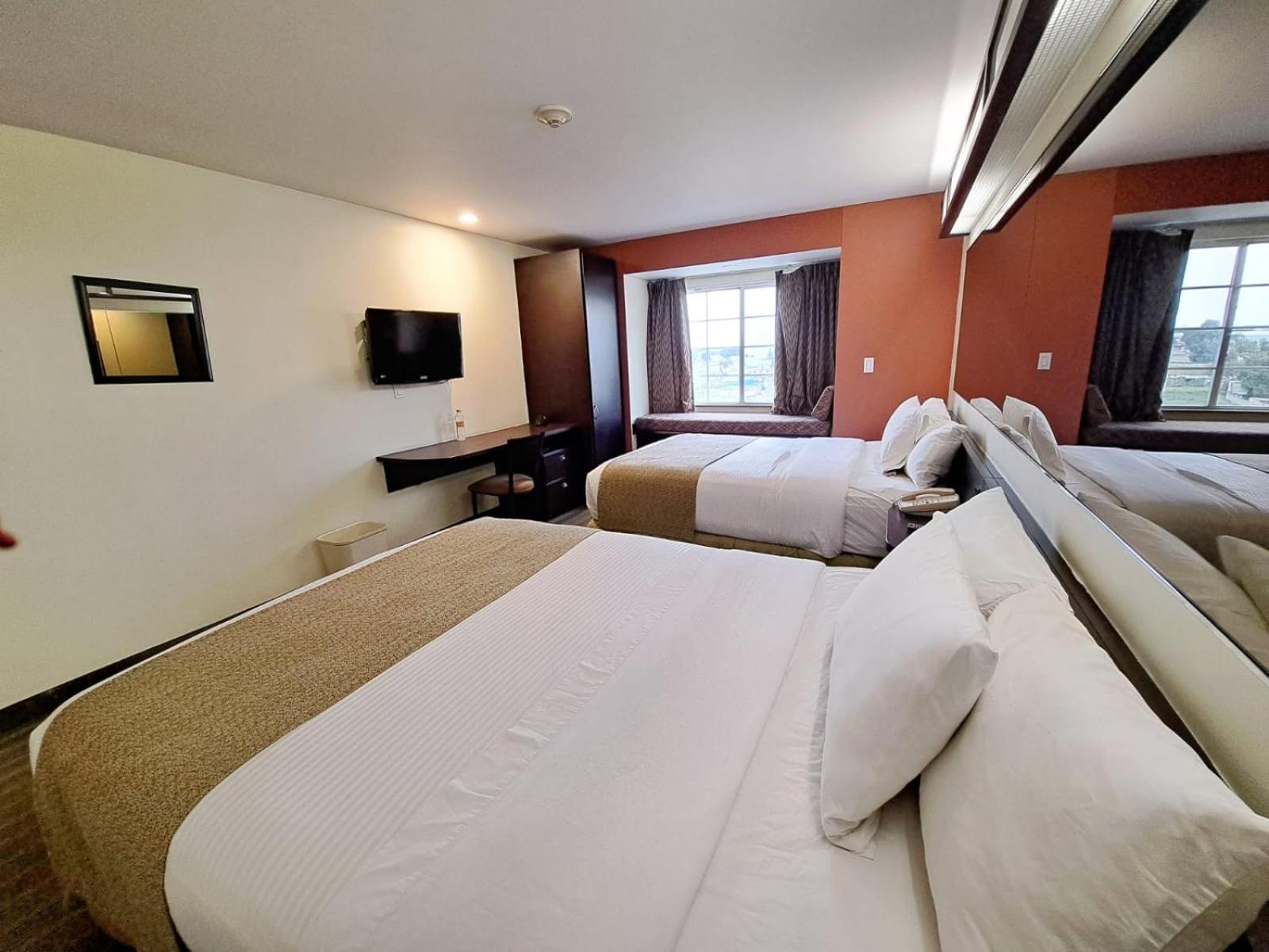 Queen Room with Two Queen Beds - Smoking - Photo 1