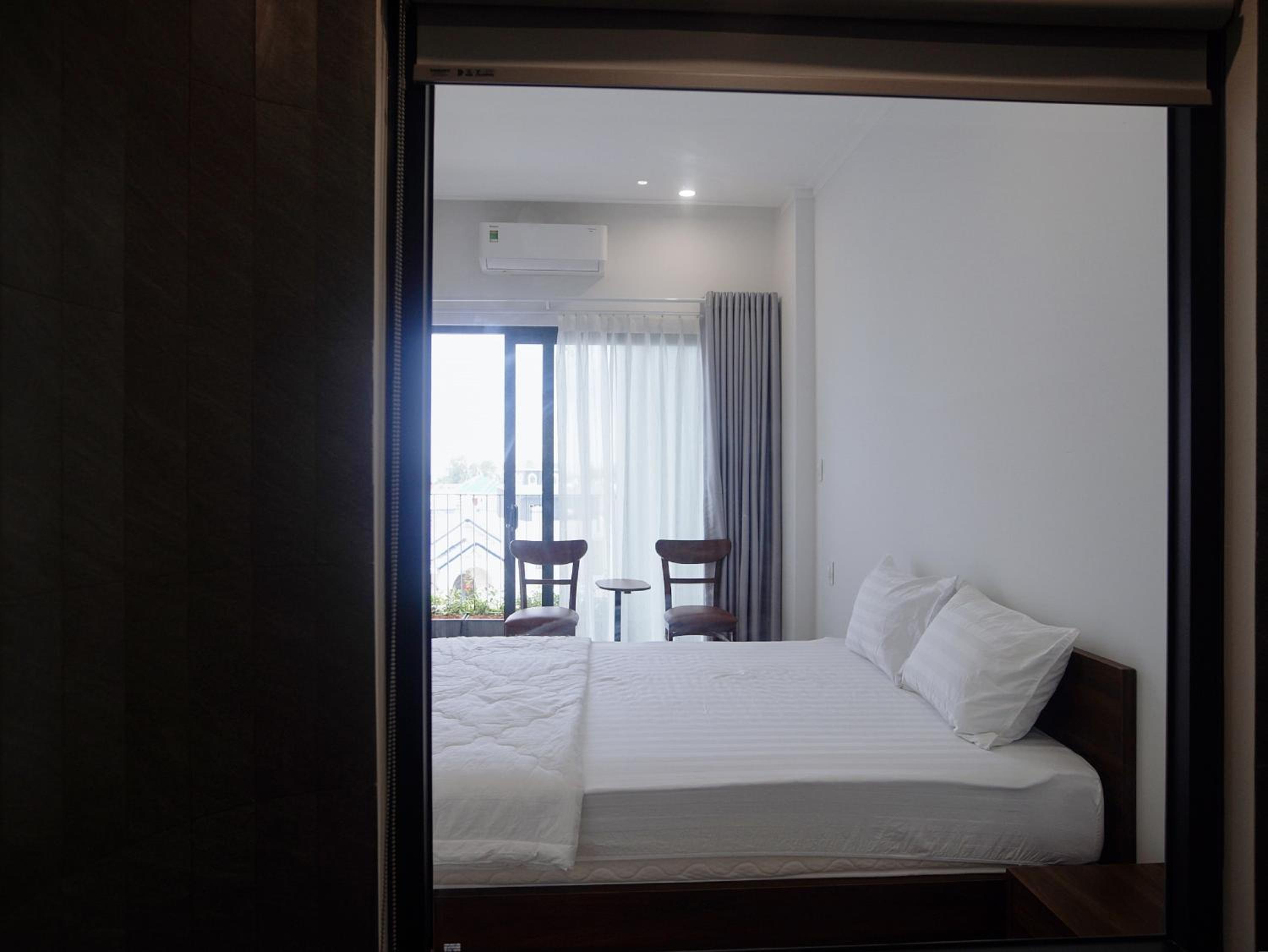 Deluxe Triple Room - Photo 20