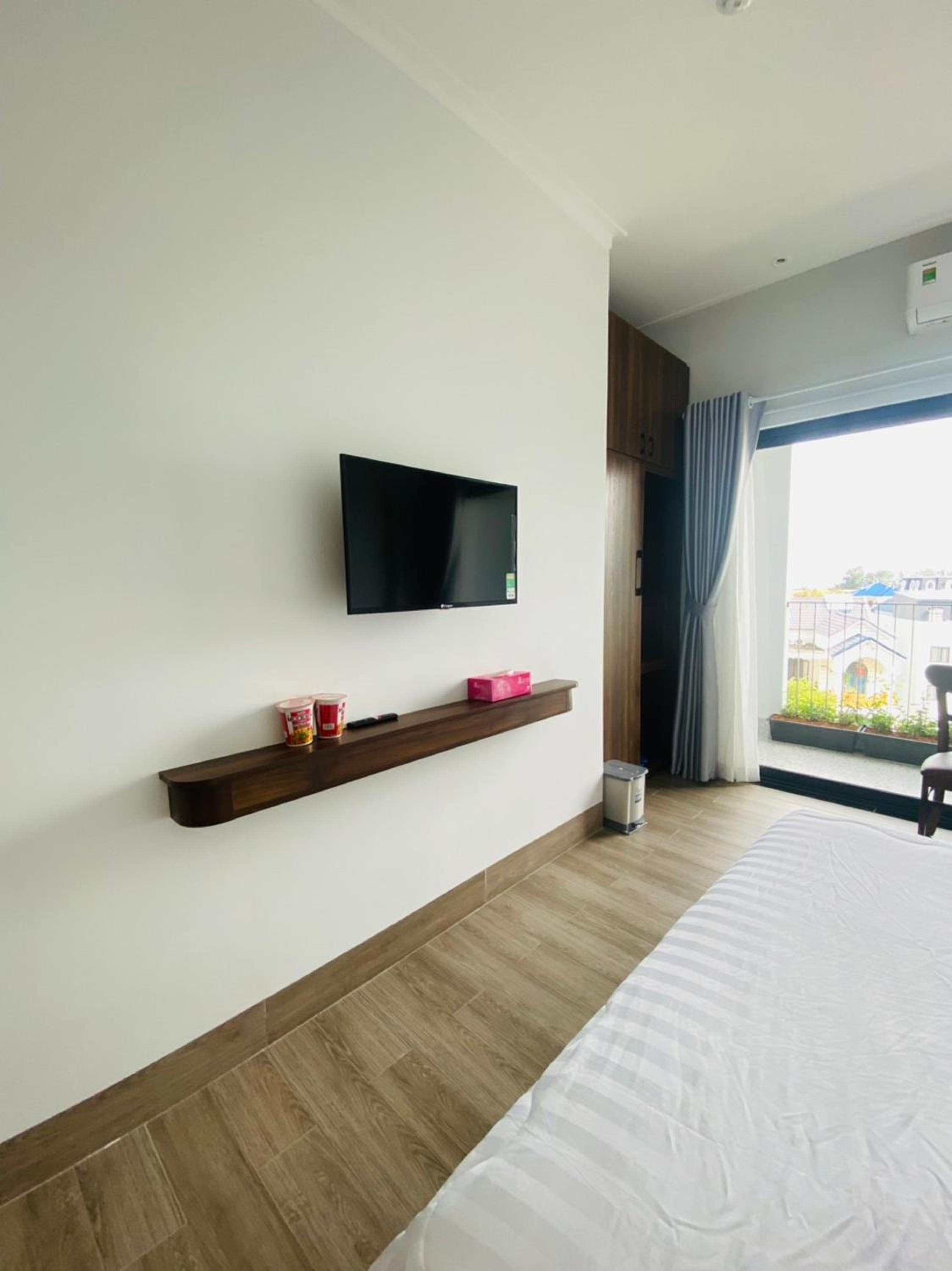 Deluxe Triple Room - Photo 22