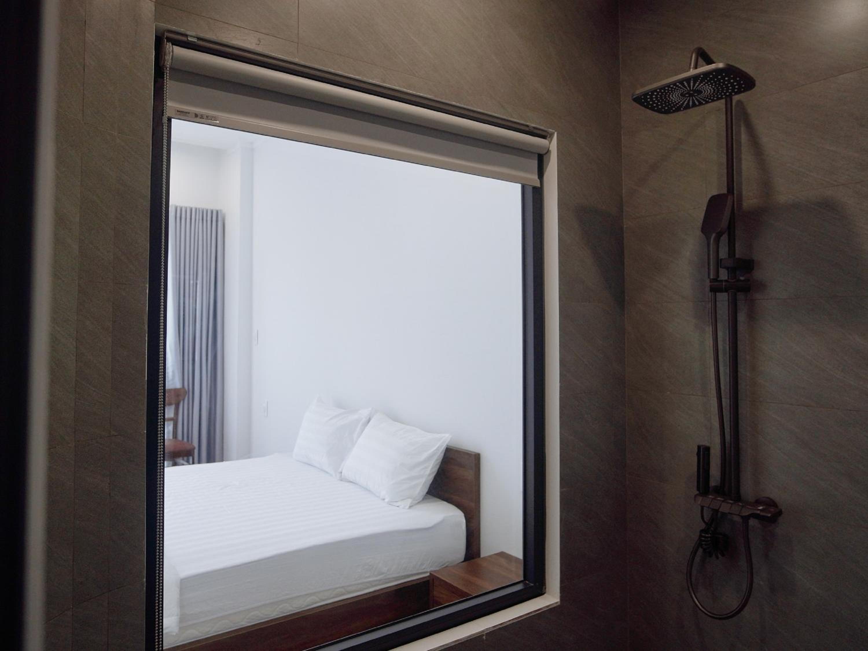 Deluxe Triple Room - Photo 21