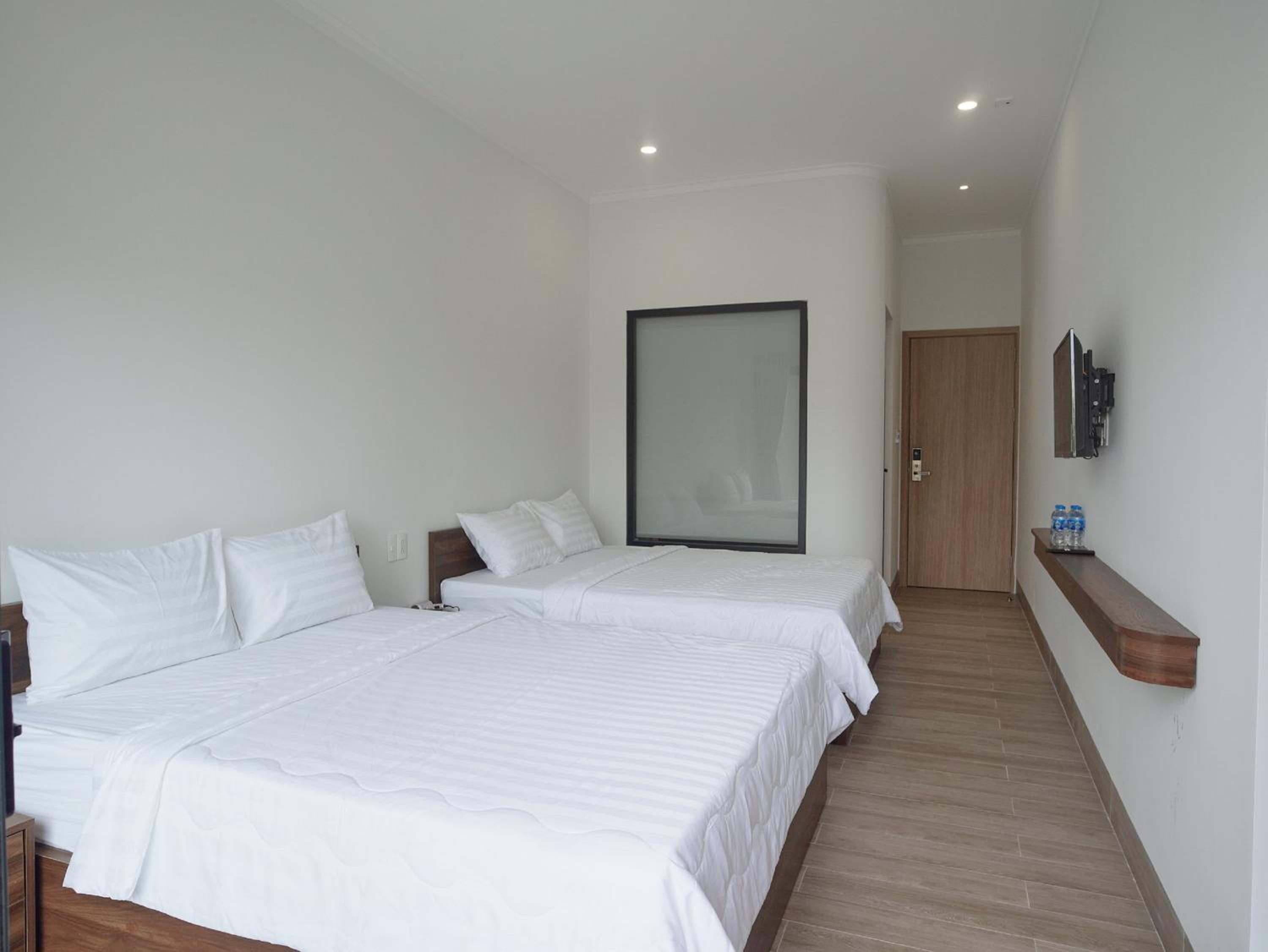 Deluxe Quadruple Room - Photo 1