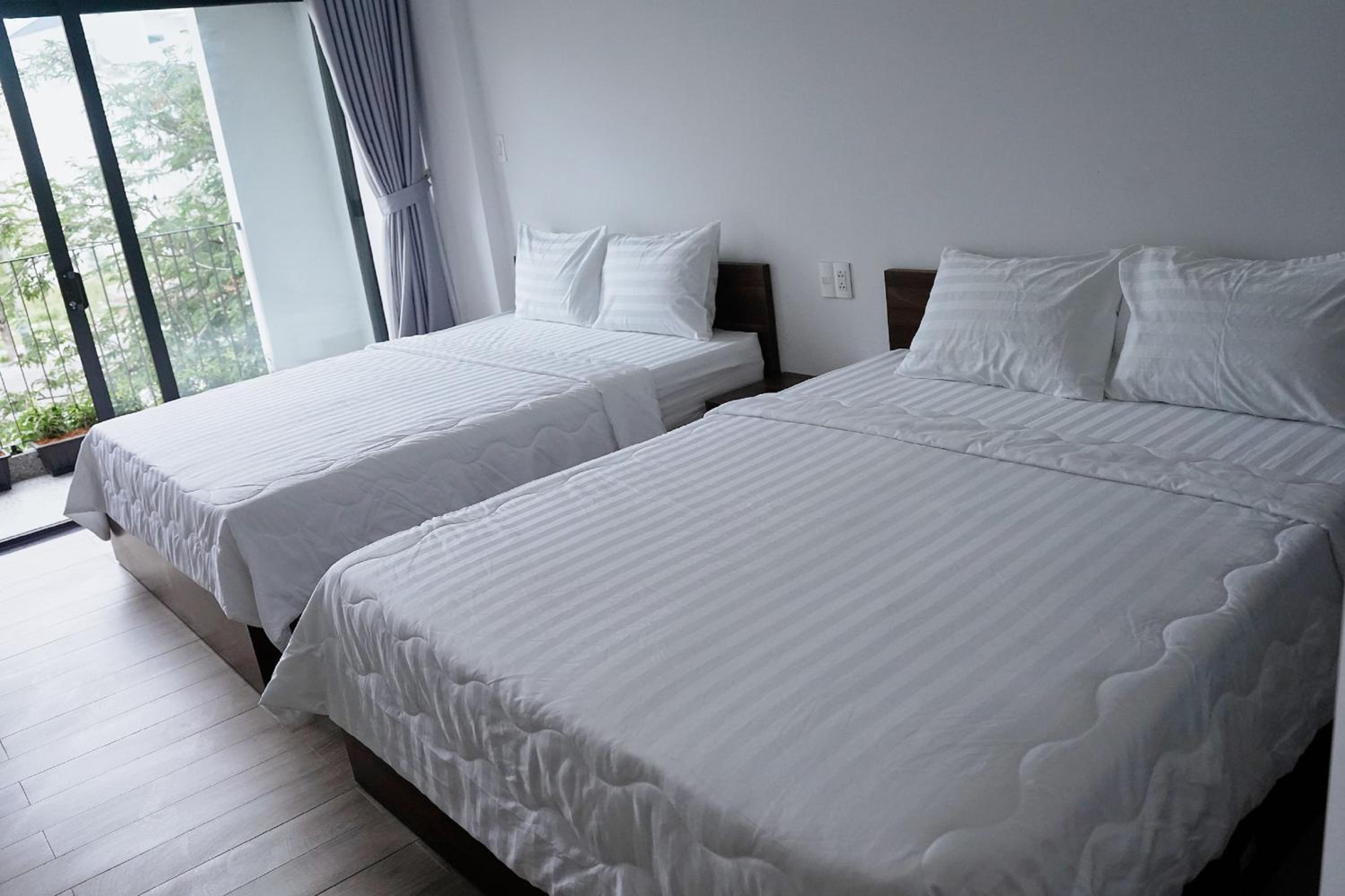 Deluxe Quadruple Room - Photo 28