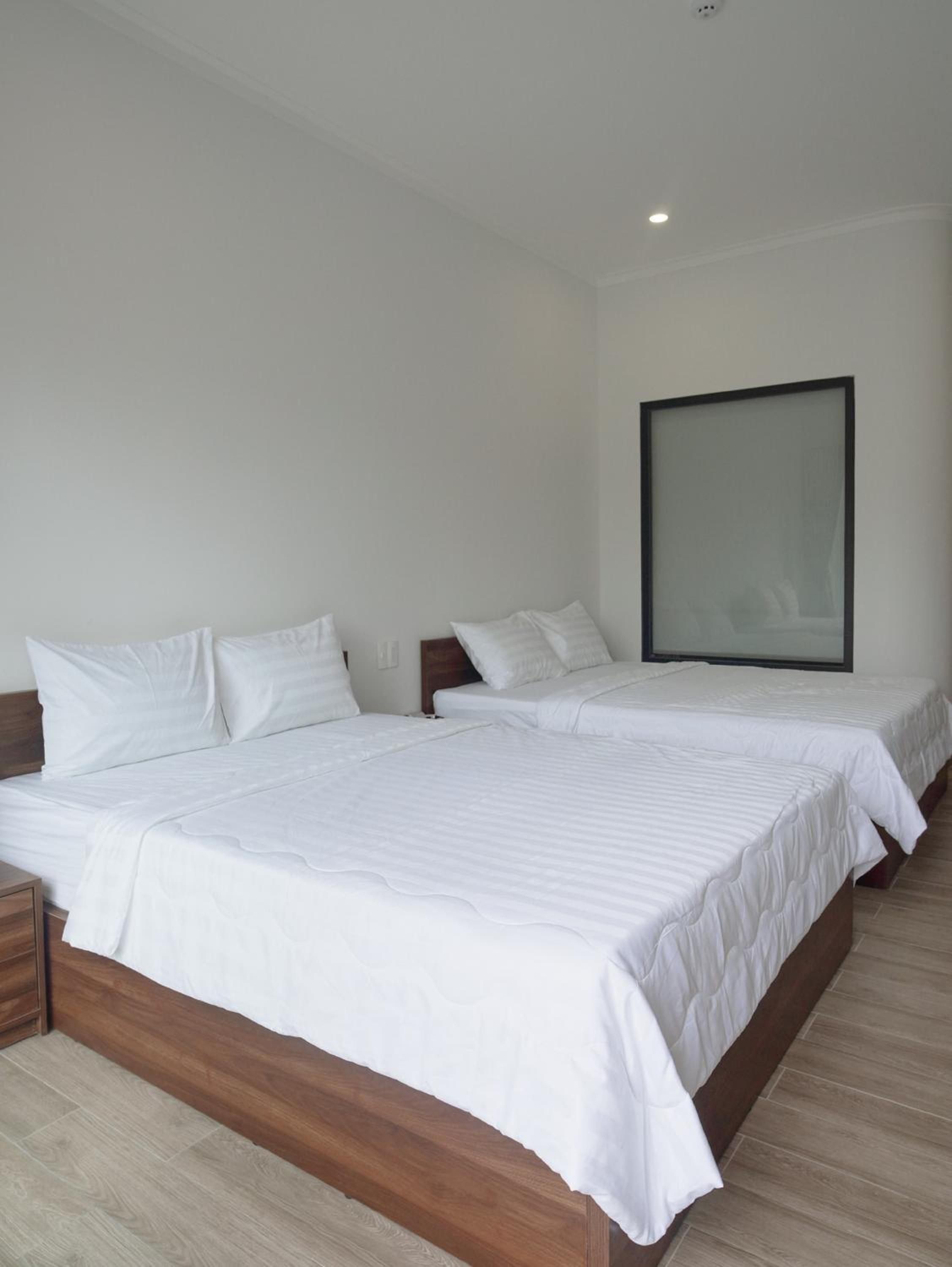 Deluxe Quadruple Room - Photo 22
