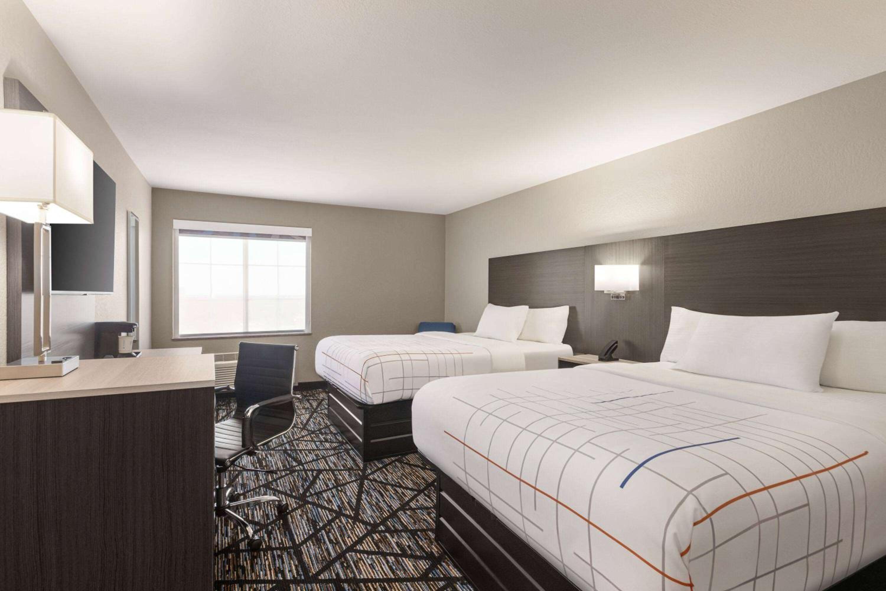 Deluxe Queen Room with Two Queen Beds - Photo 1