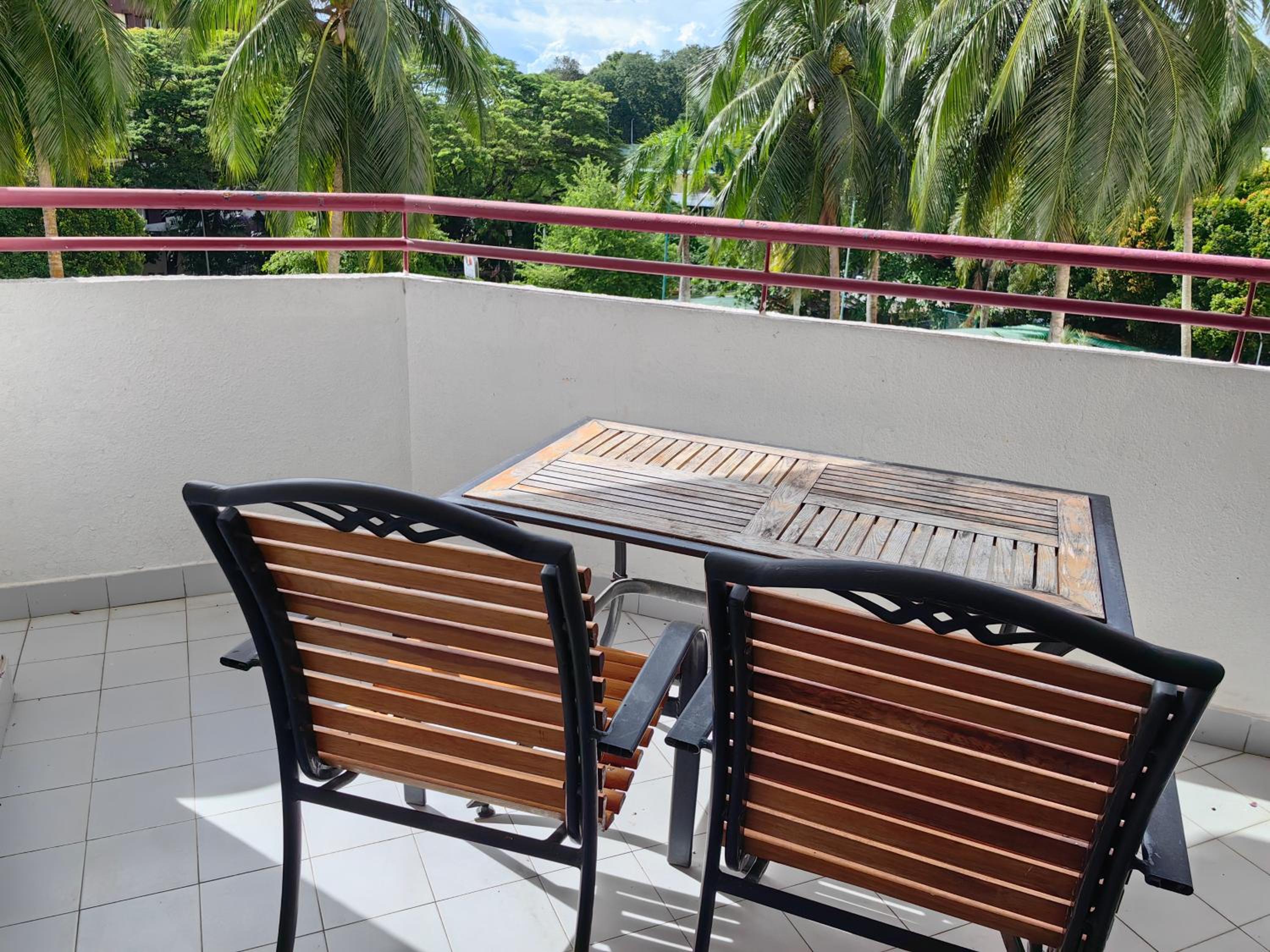 Three-Bedroom Apartment with Balcony photo 2