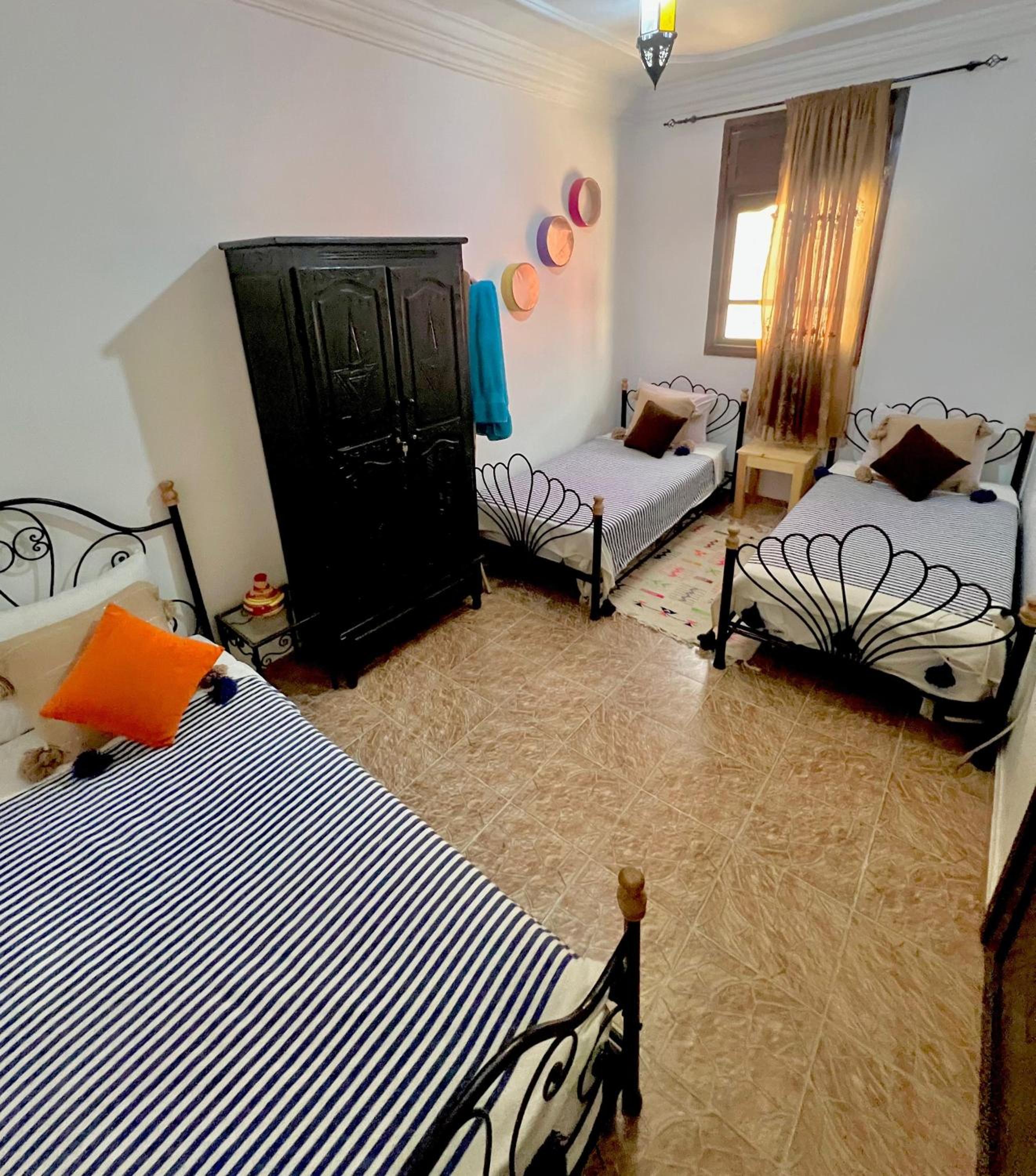 Basic Triple Room with Shared Bathroom photo 1