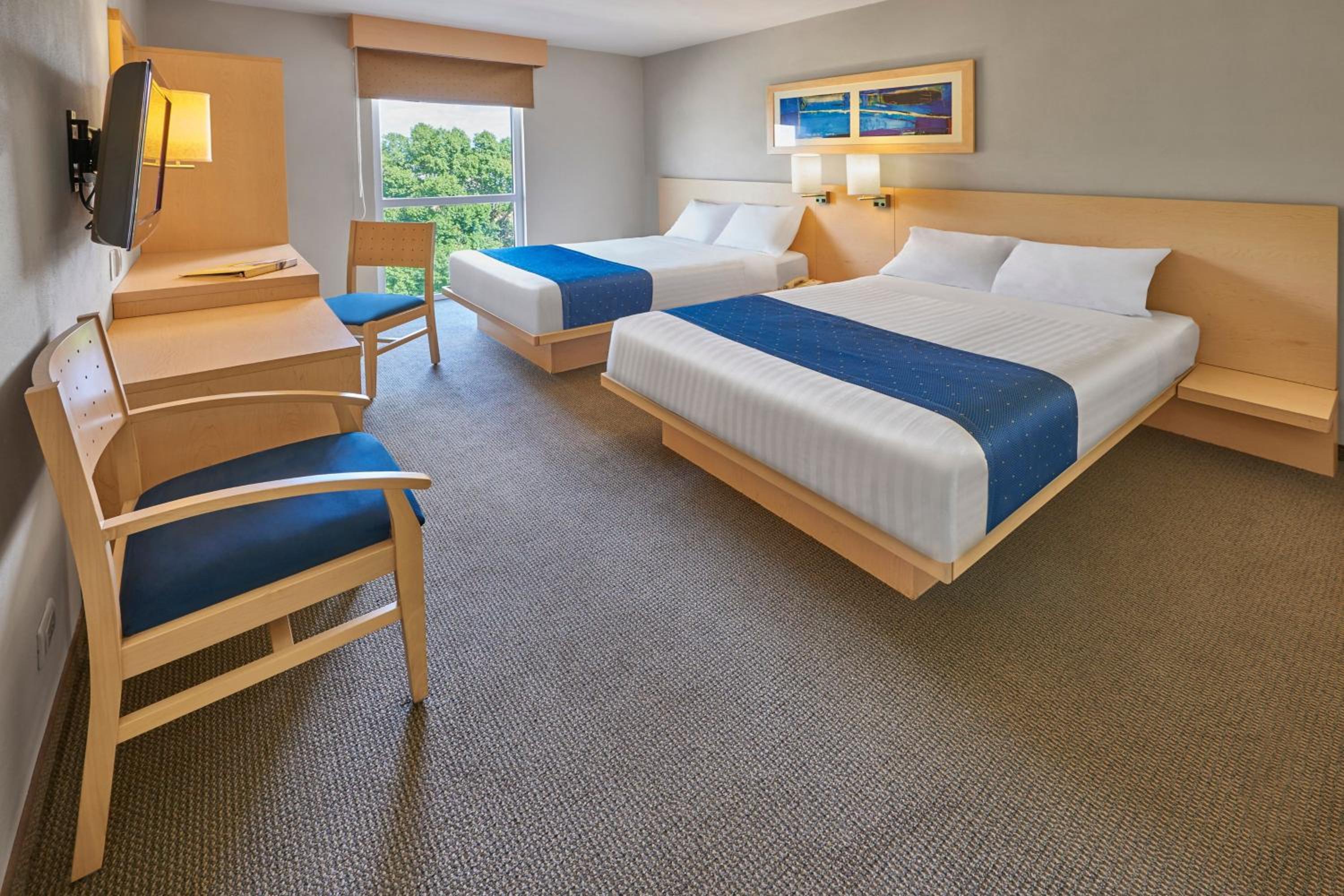 Queen Room with Two Queen Beds - Photo 6