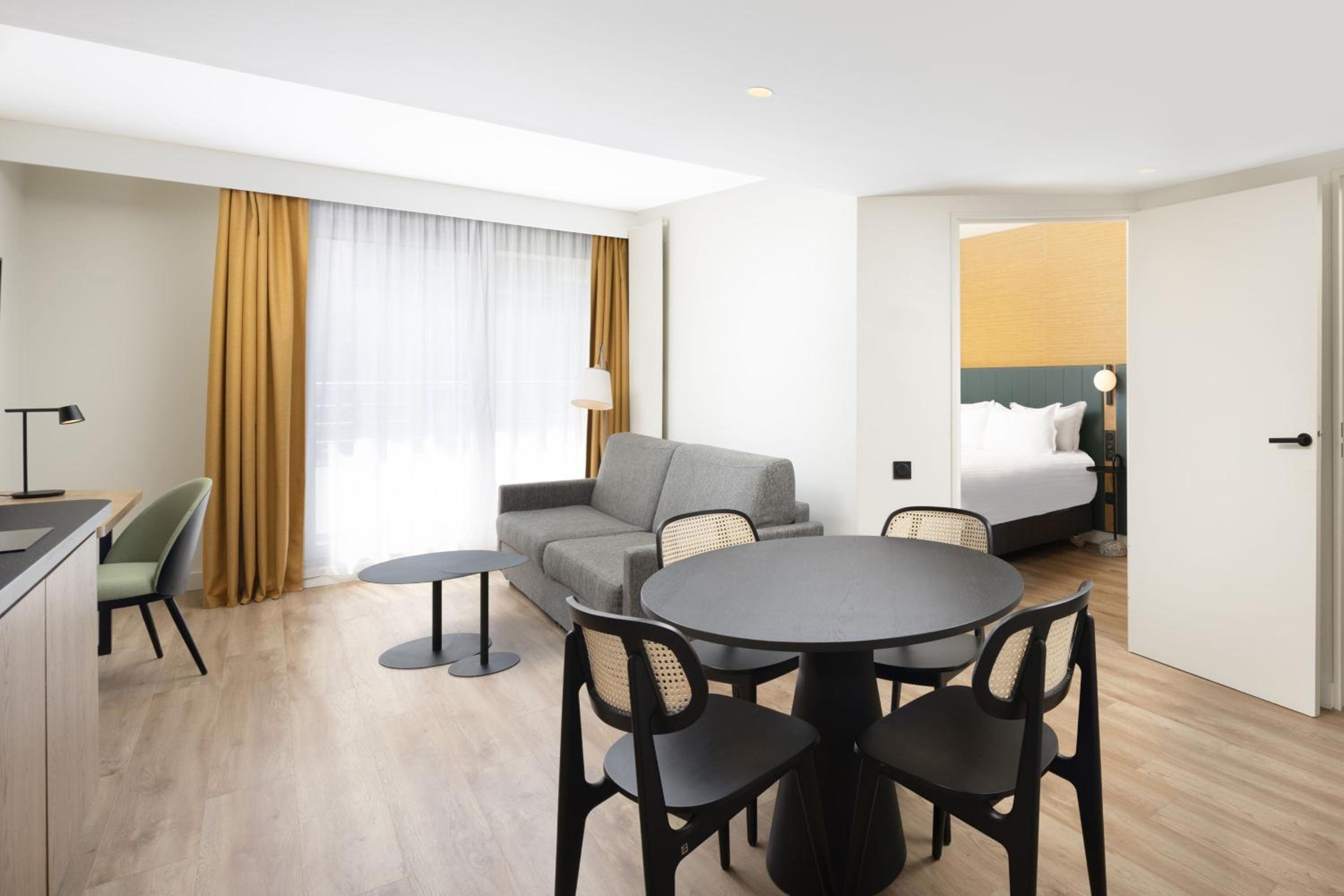 One-Bedroom King Suite with Sofa Bed photo 1