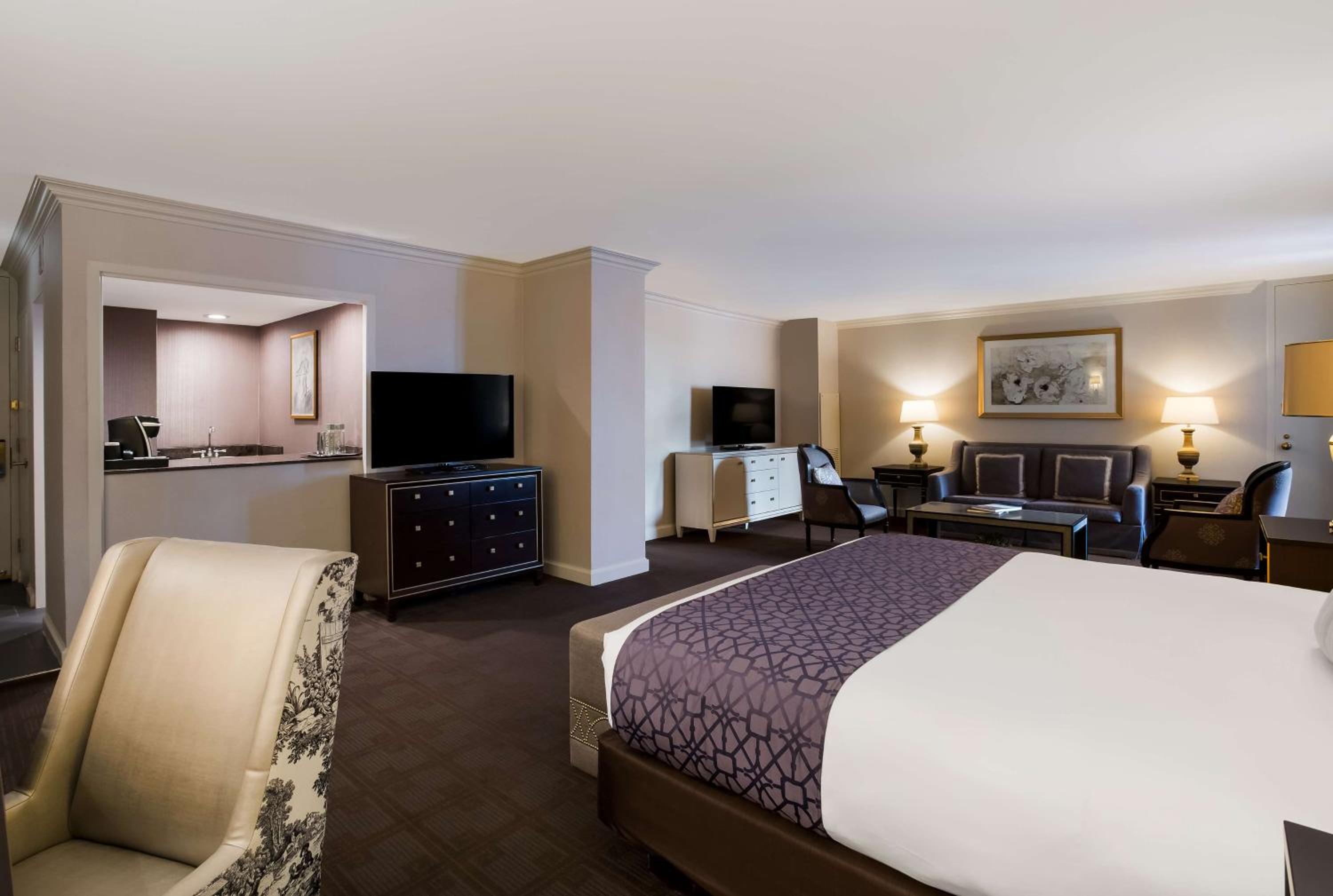 One Bedroom Suite, King Bed, Bourbon St. Balcony (Semi Private), Sofa Bed