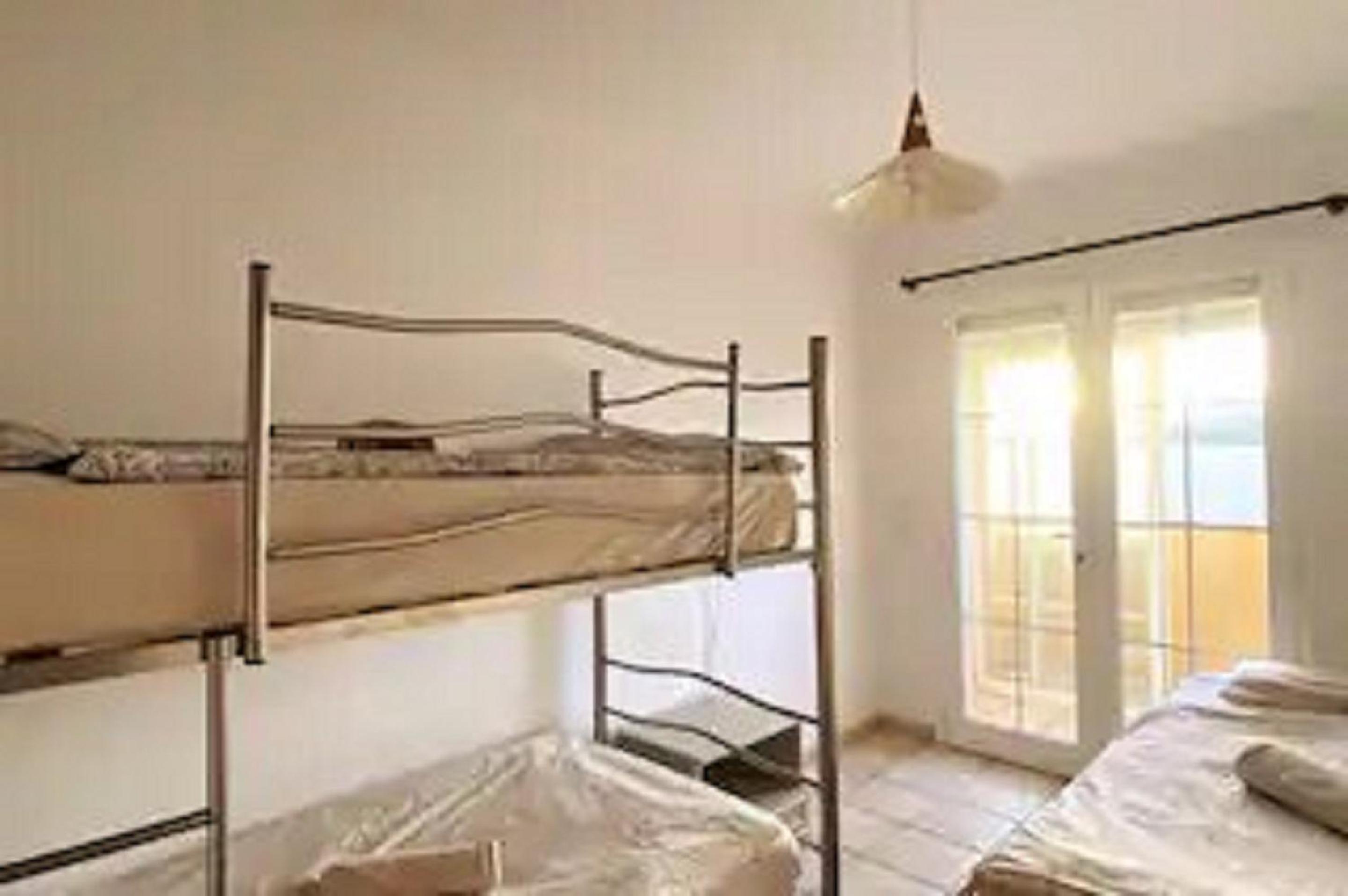 Cama en habitación compartida de 4 camas