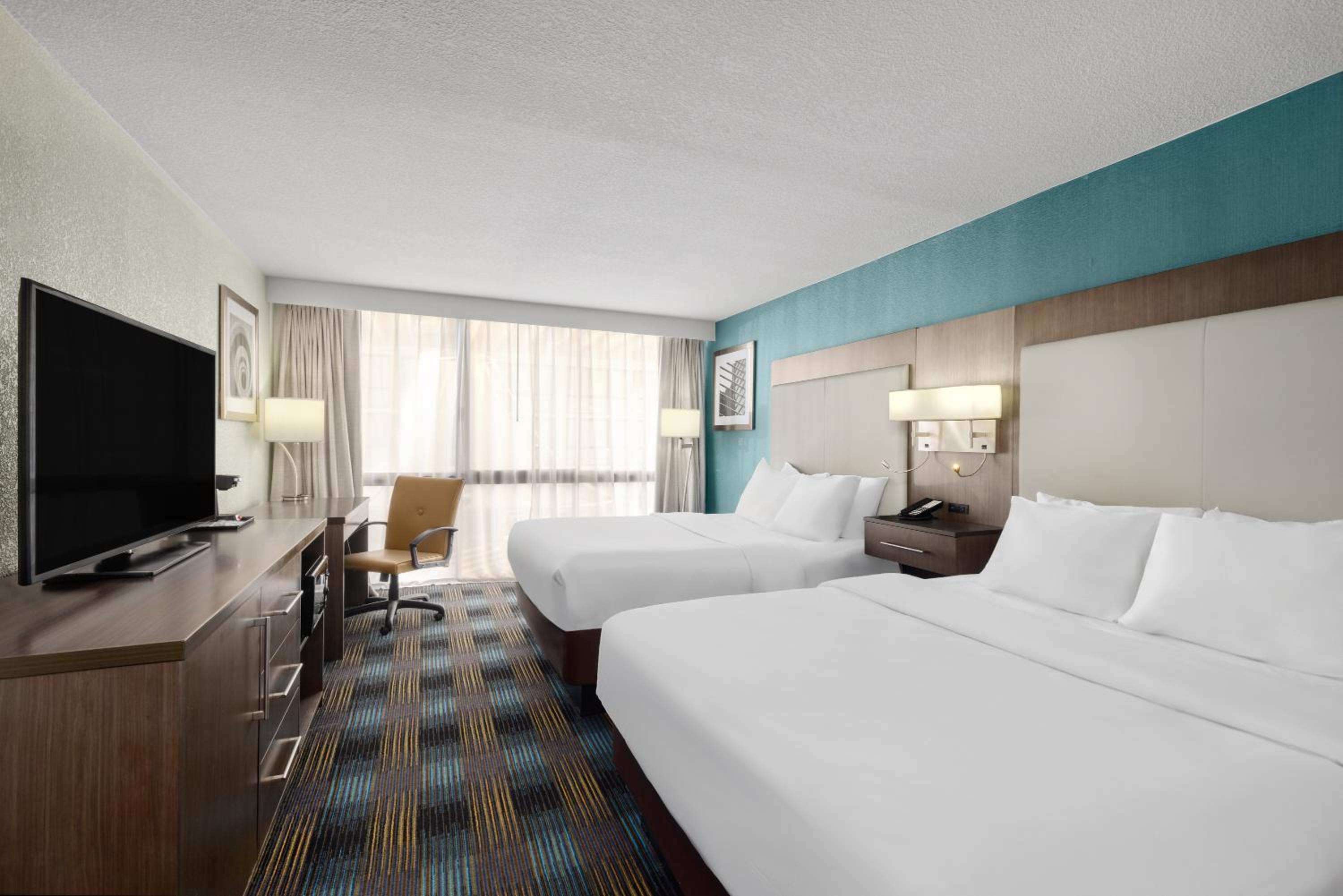 Queen Room with Two Queen Beds - Non-Smoking - Photo 1