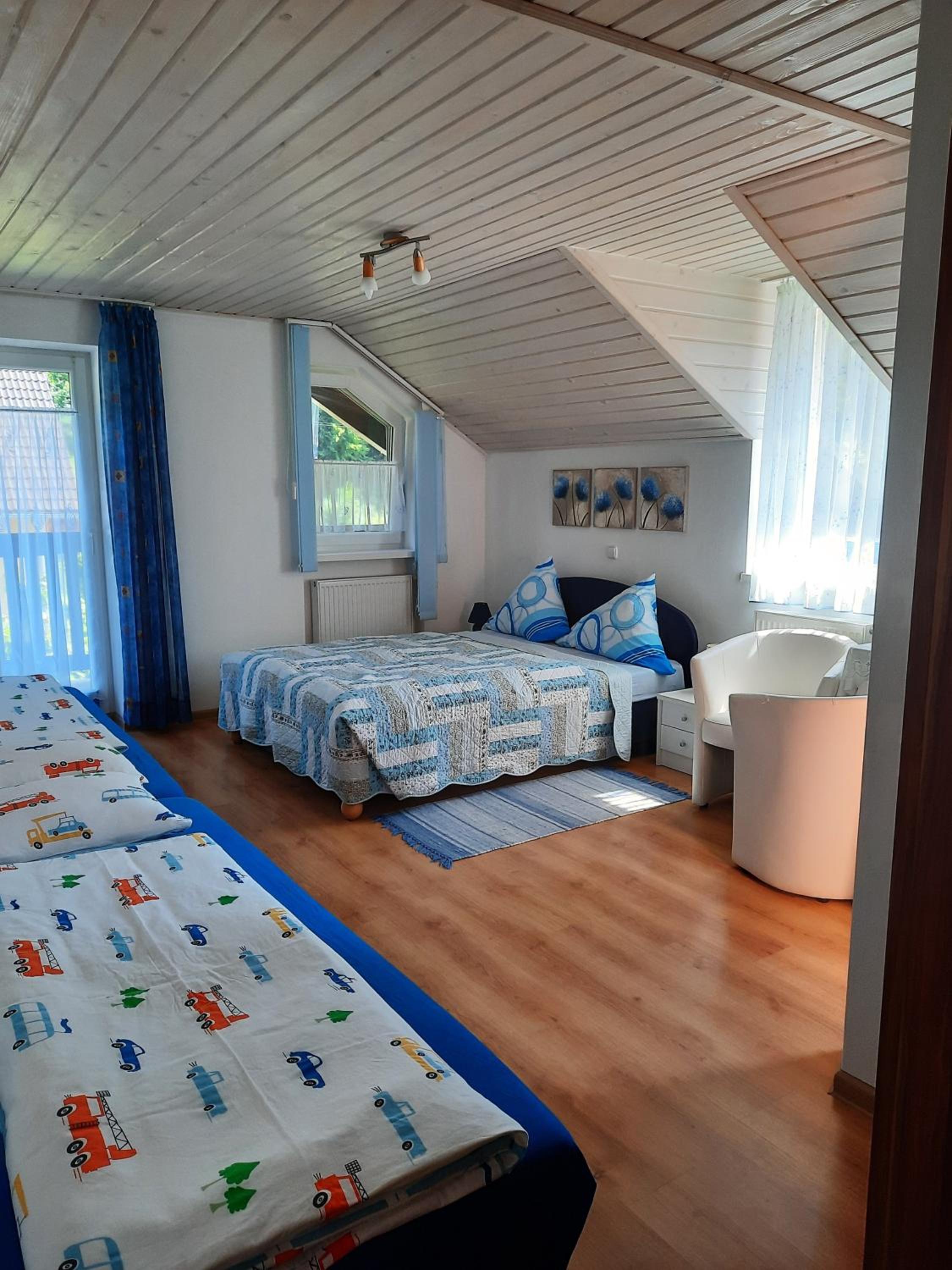 Quadruple Room with Private Bathroom