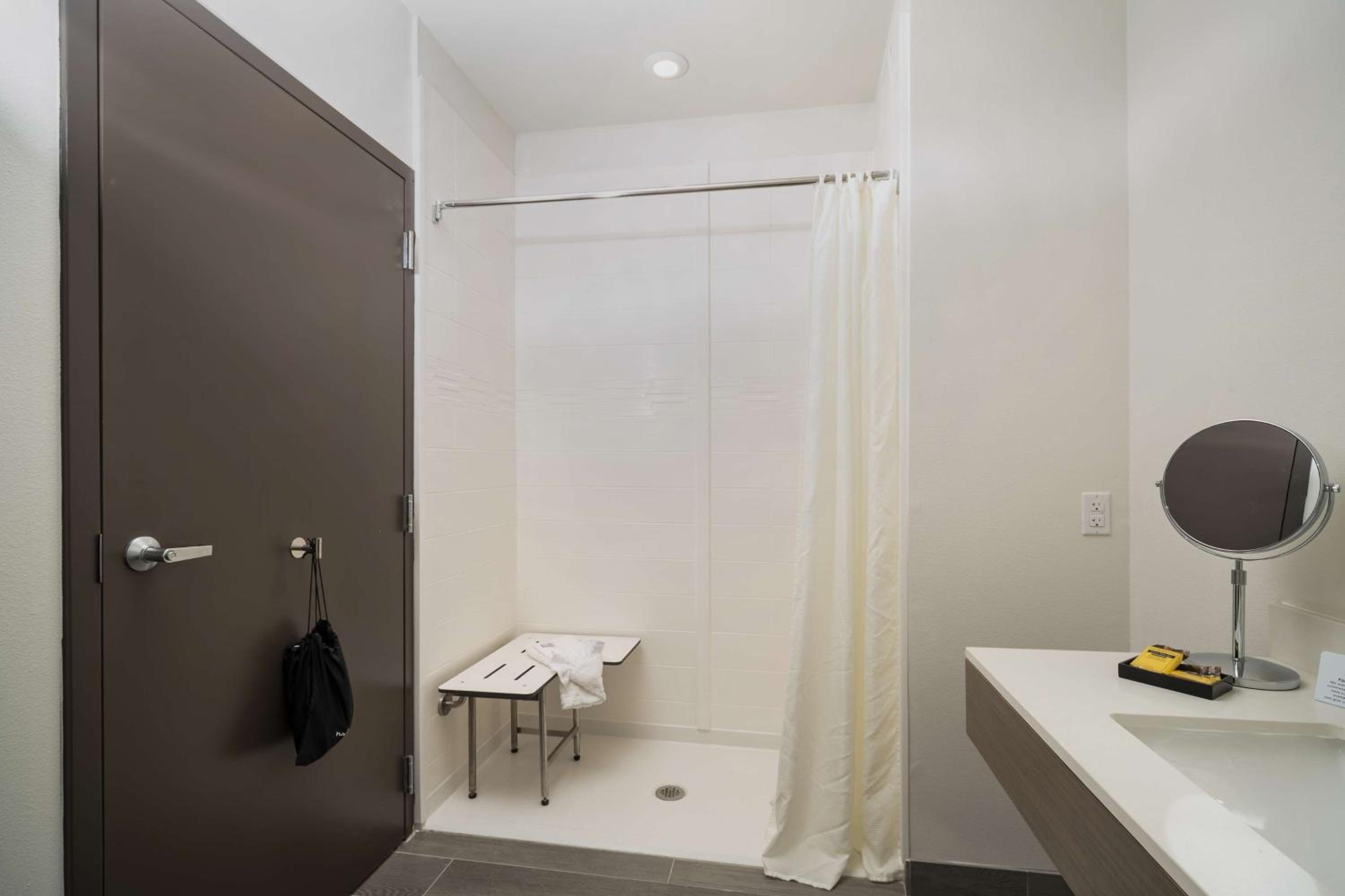 King Suite with Roll - In Shower - Disability Access