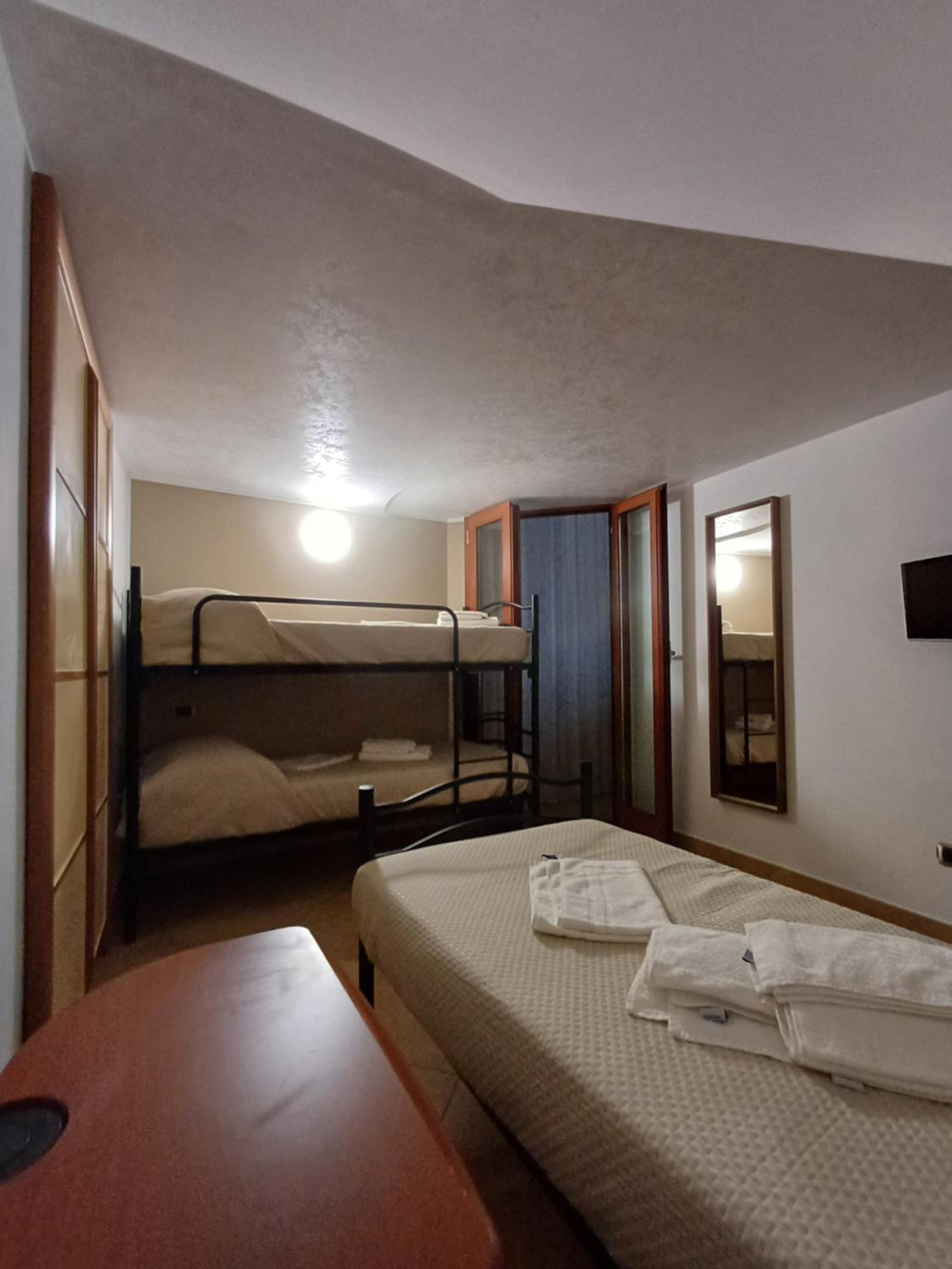Bed In Male Dormitory Room