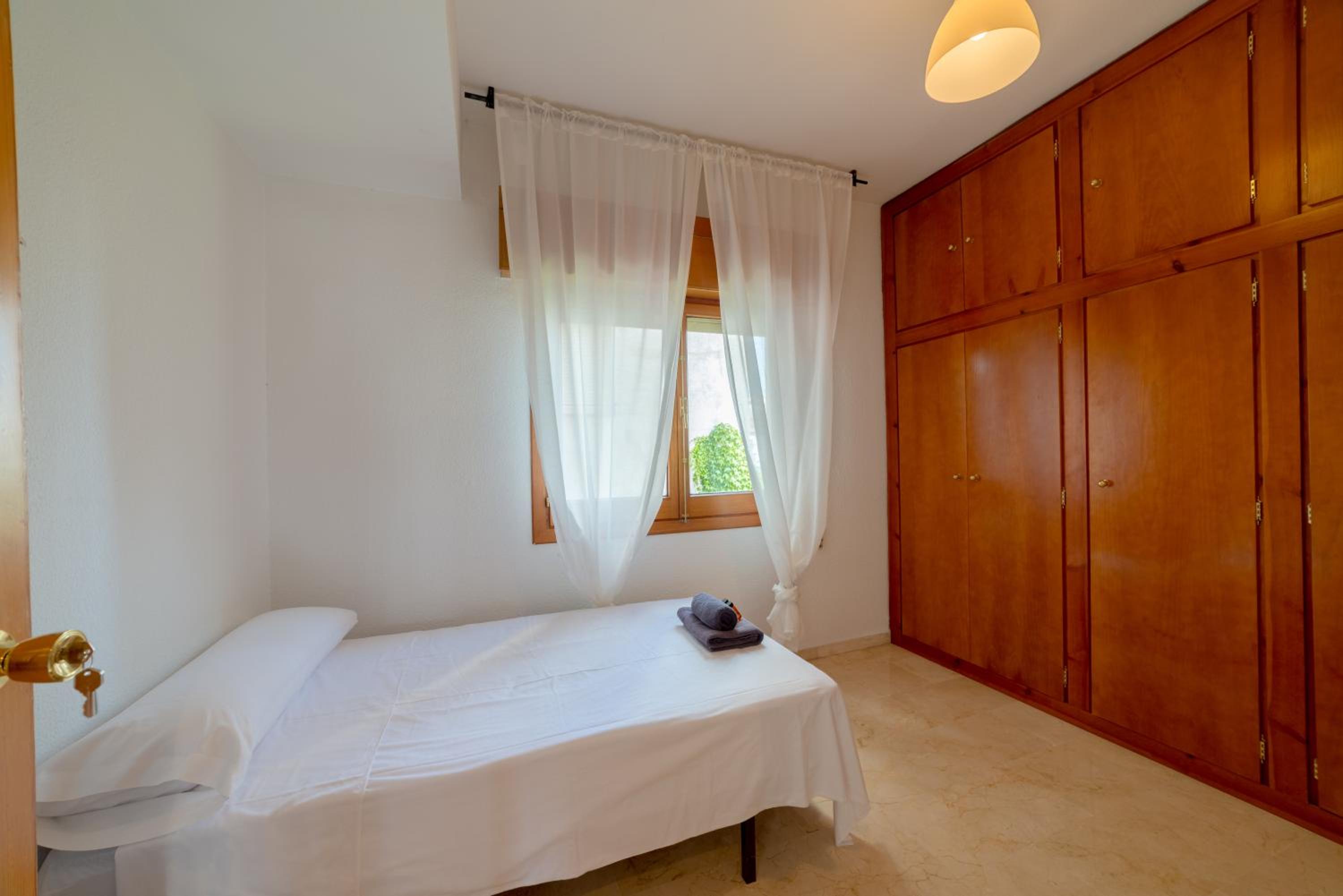 Habitación individual con baño compartido