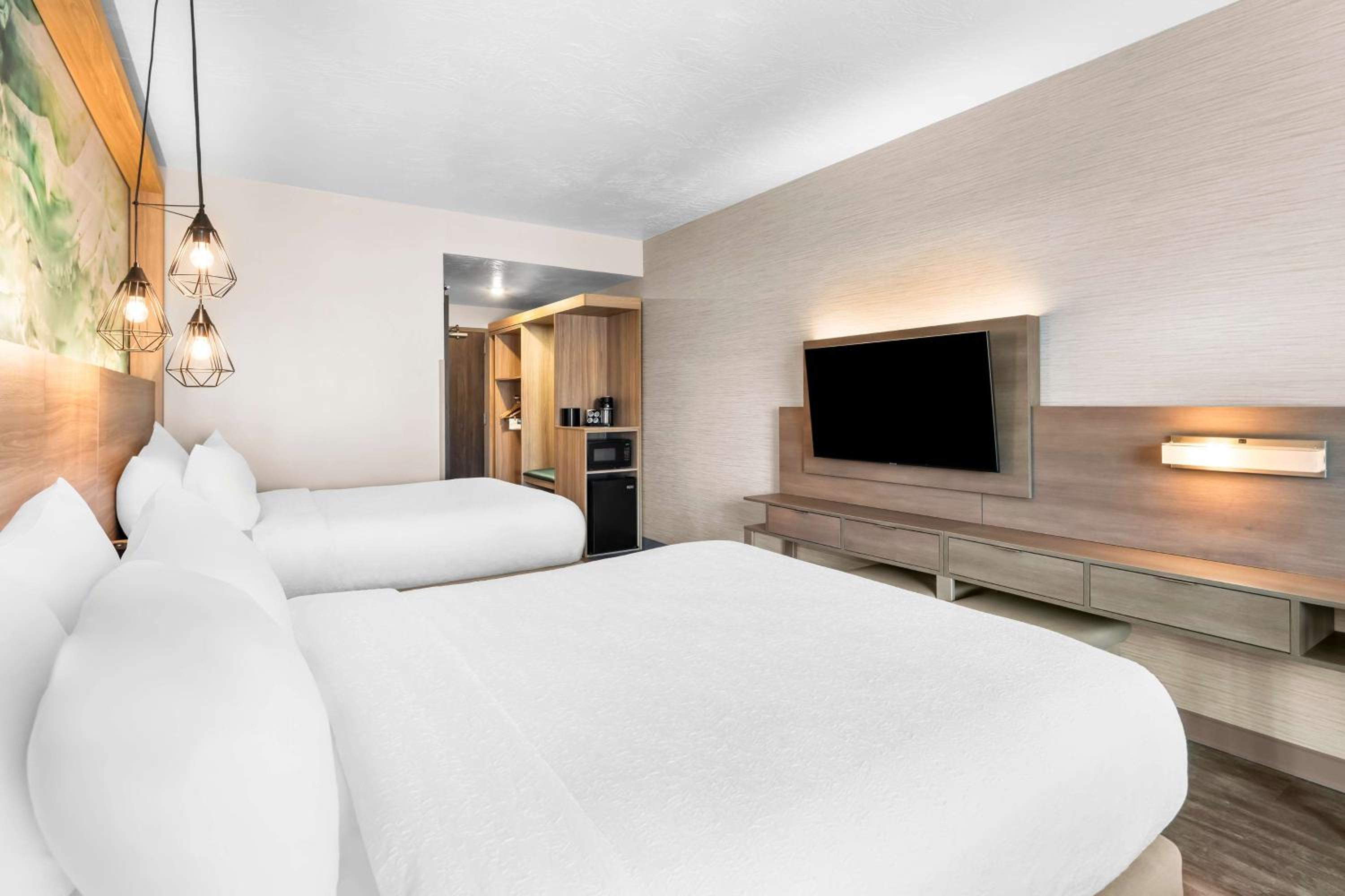 Queen Room with Two Queen Beds with Walk-In Shower - Photo 2