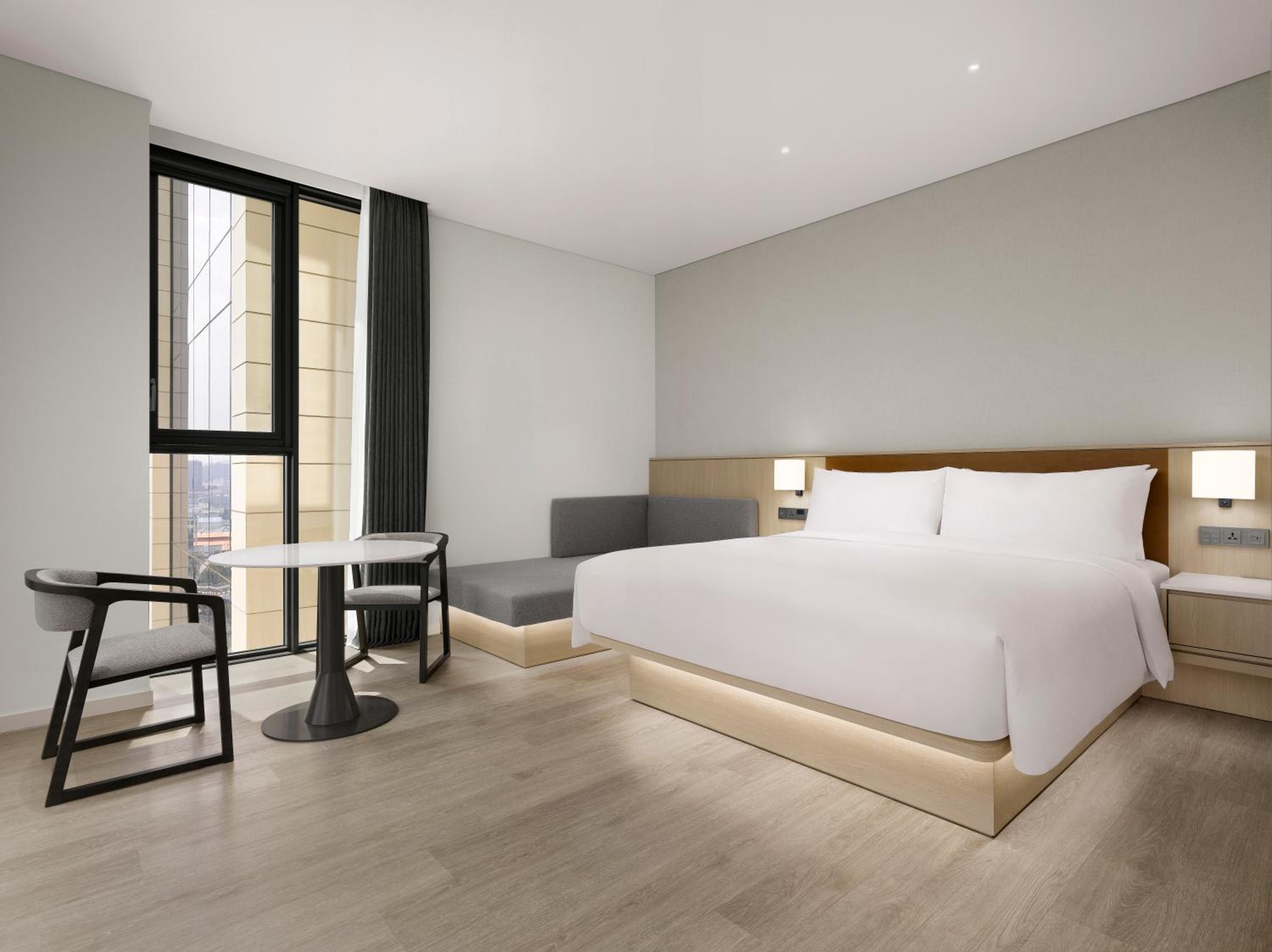 King Studio Suite with Sofa Bed and City View - Photo 1