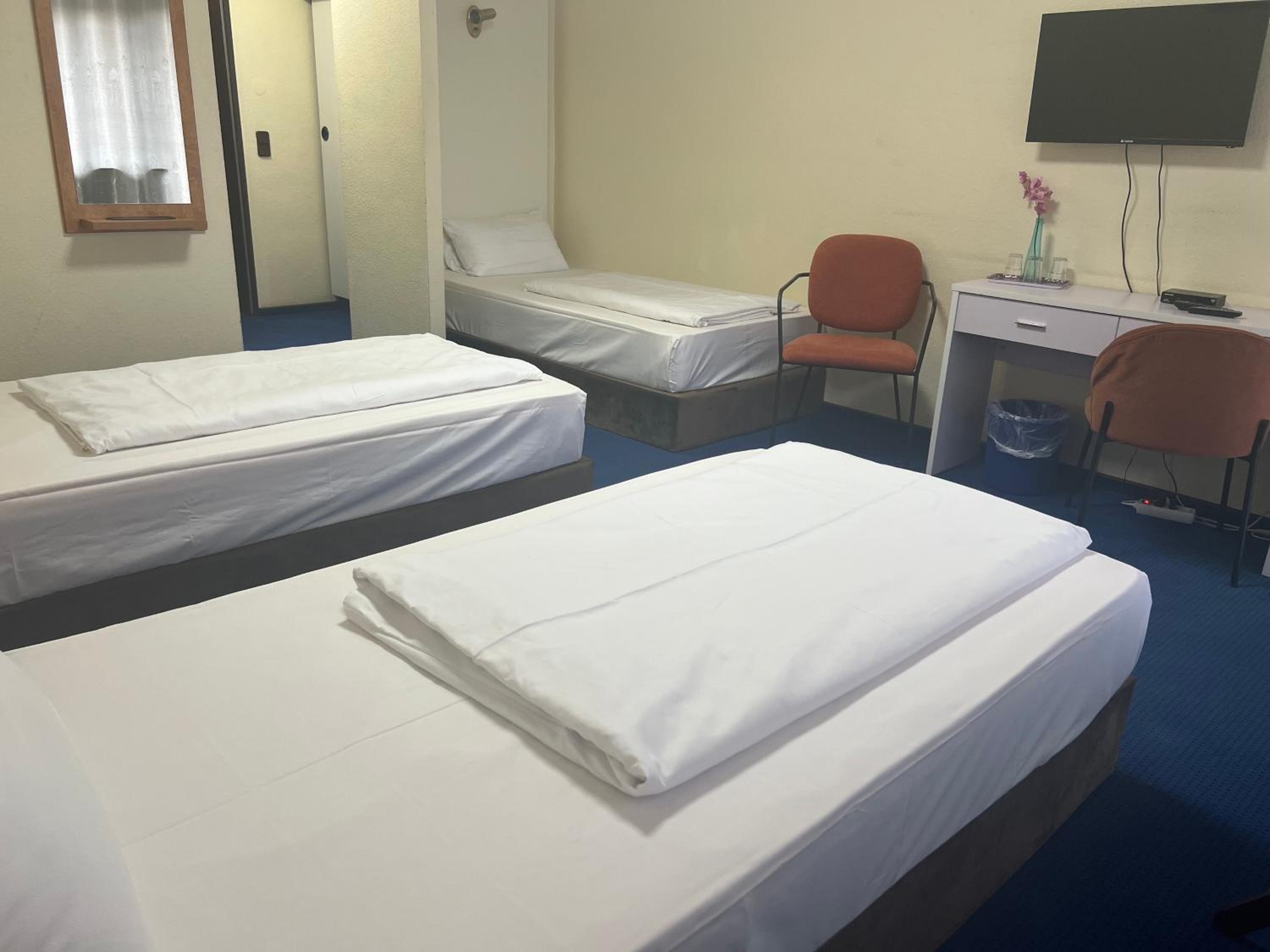 Triple Room - Photo 2