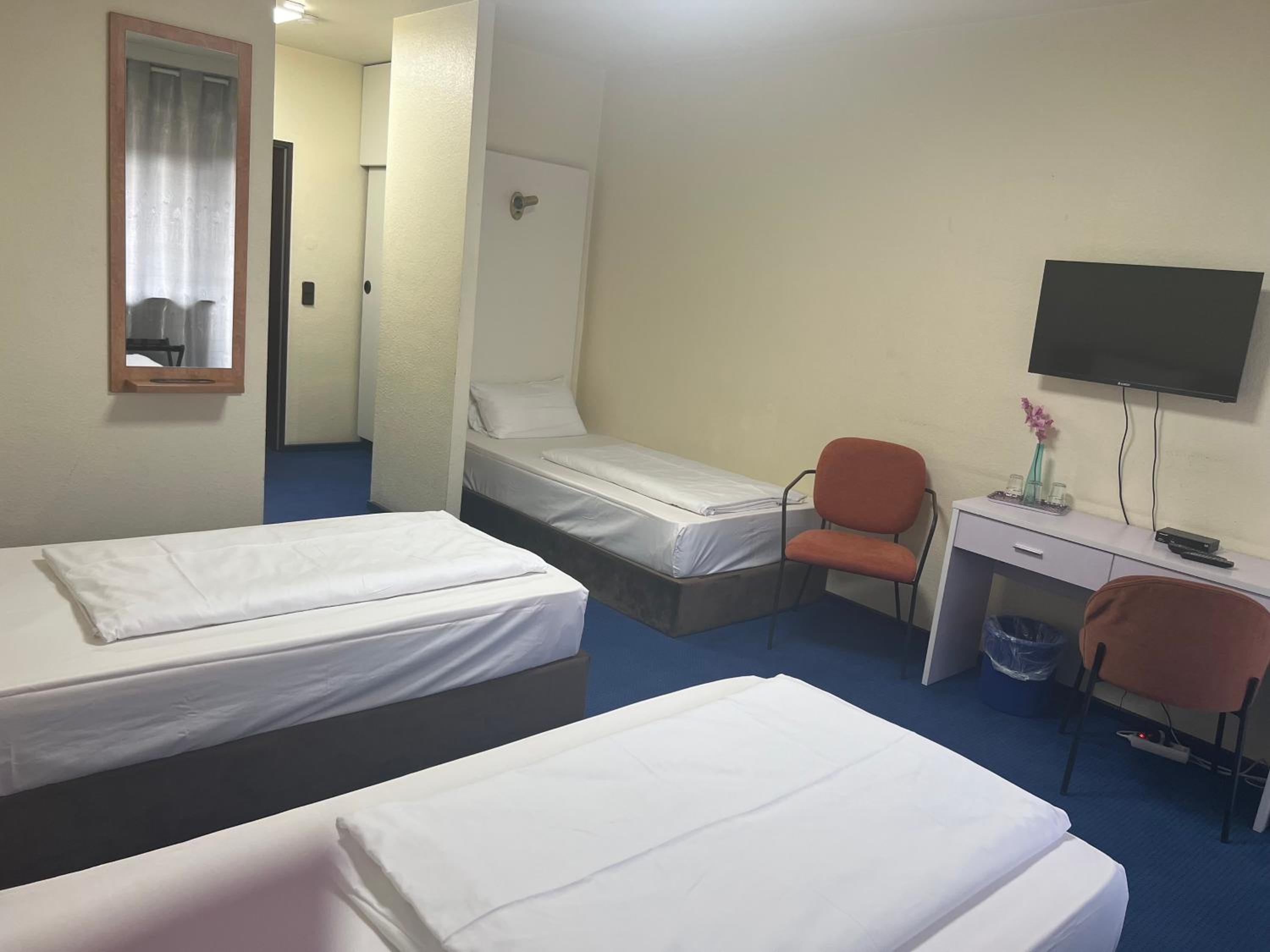 Triple Room - Photo 1