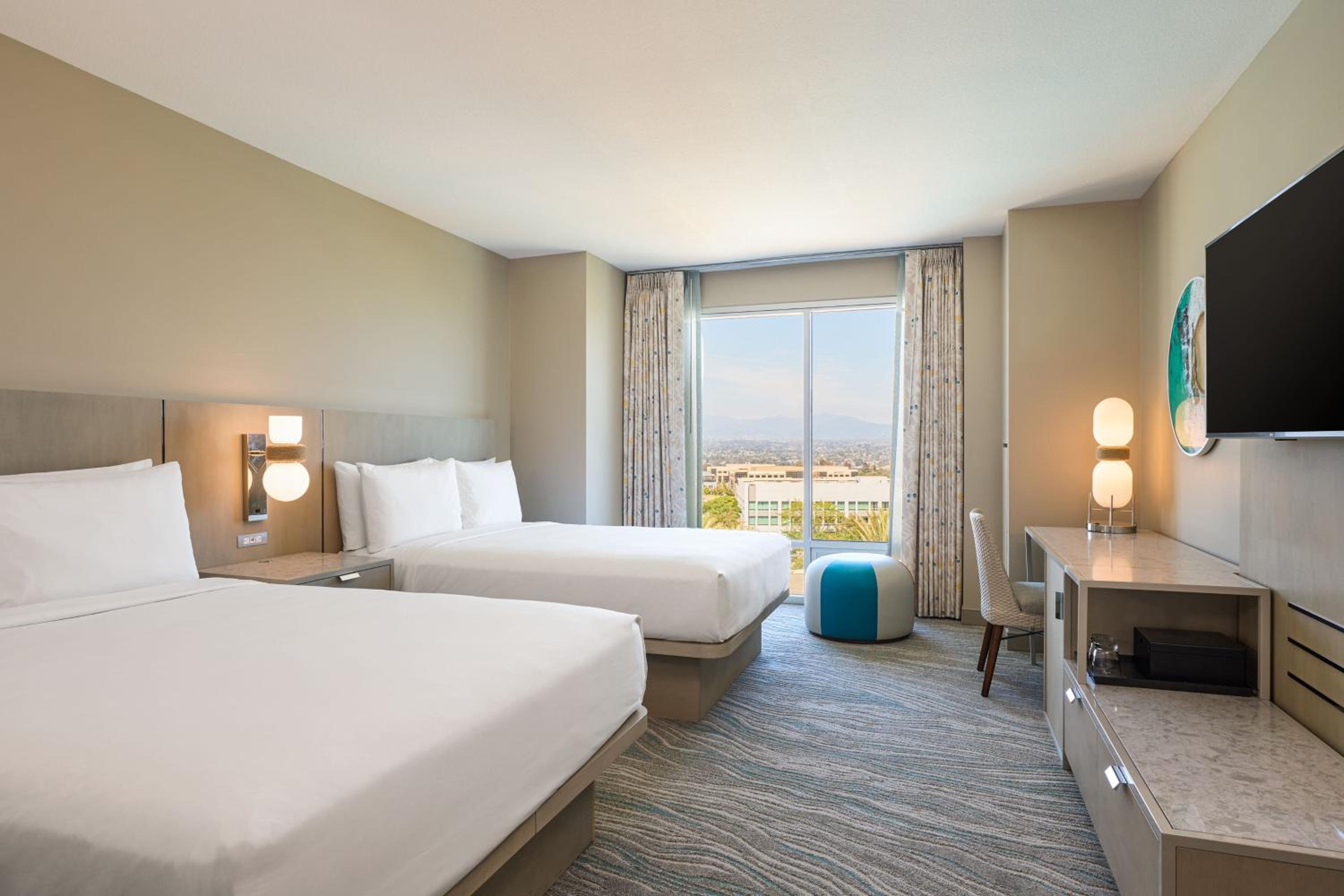 Queen Room with Two Queen Beds and Pool View at Renaissance ClubSport Aliso Viejo Laguna Beach Hotel in Aliso Viejo